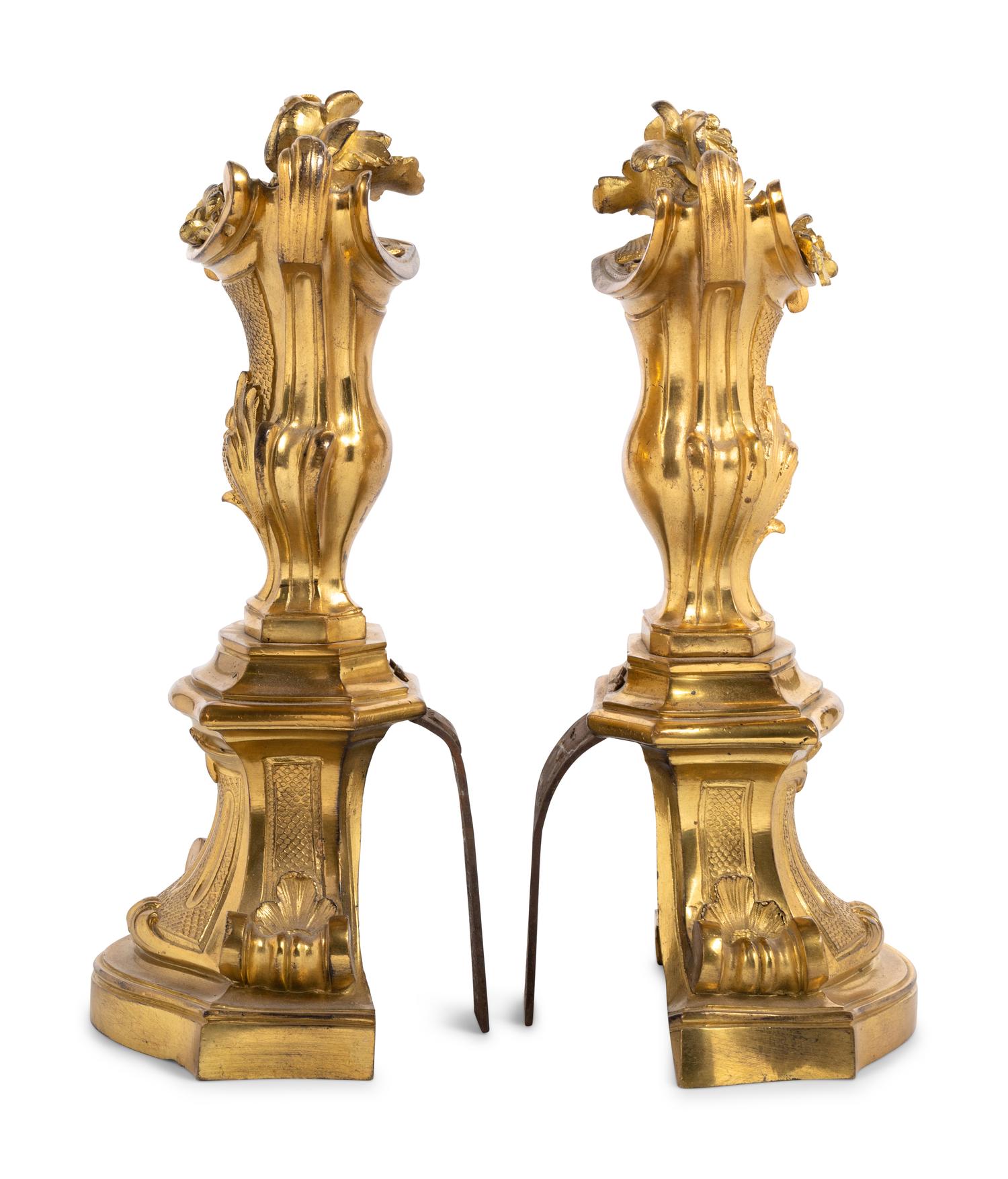 A Pair of Régence Style Gilt Bronze Chenets