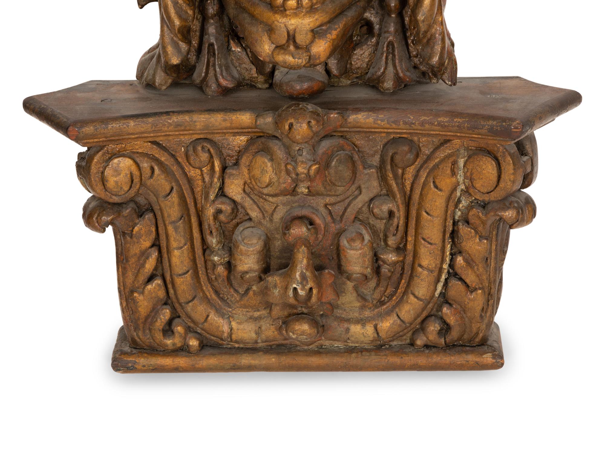 A Pair of Venetian Carved Wood Mask Wall Appliqués