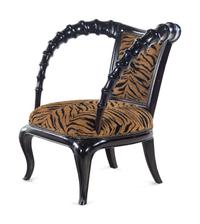 A Thomasville Hemingway Carved Wood Horn Armchair