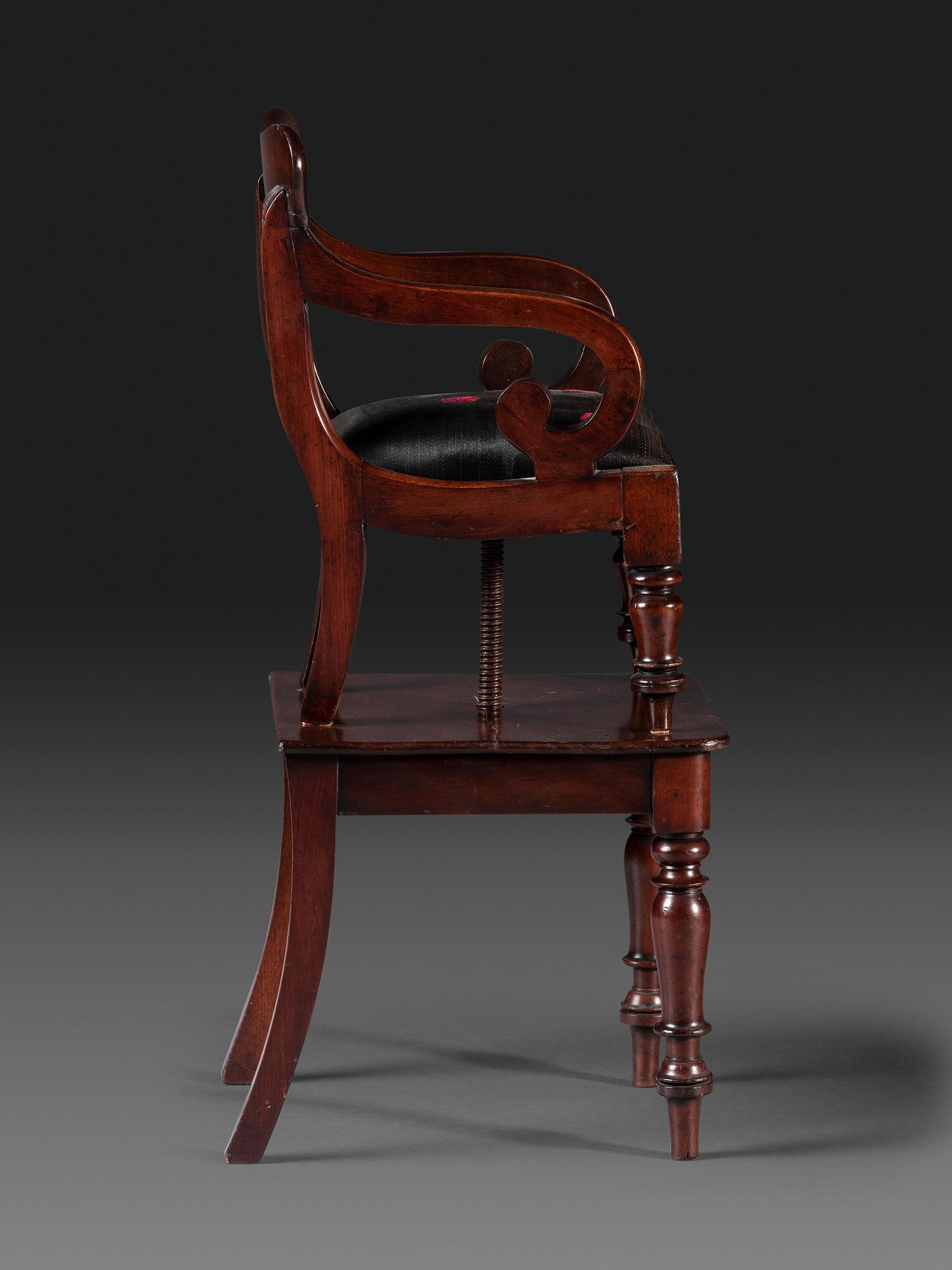 A Classical Carved Mahogany Child's Chair on Stand