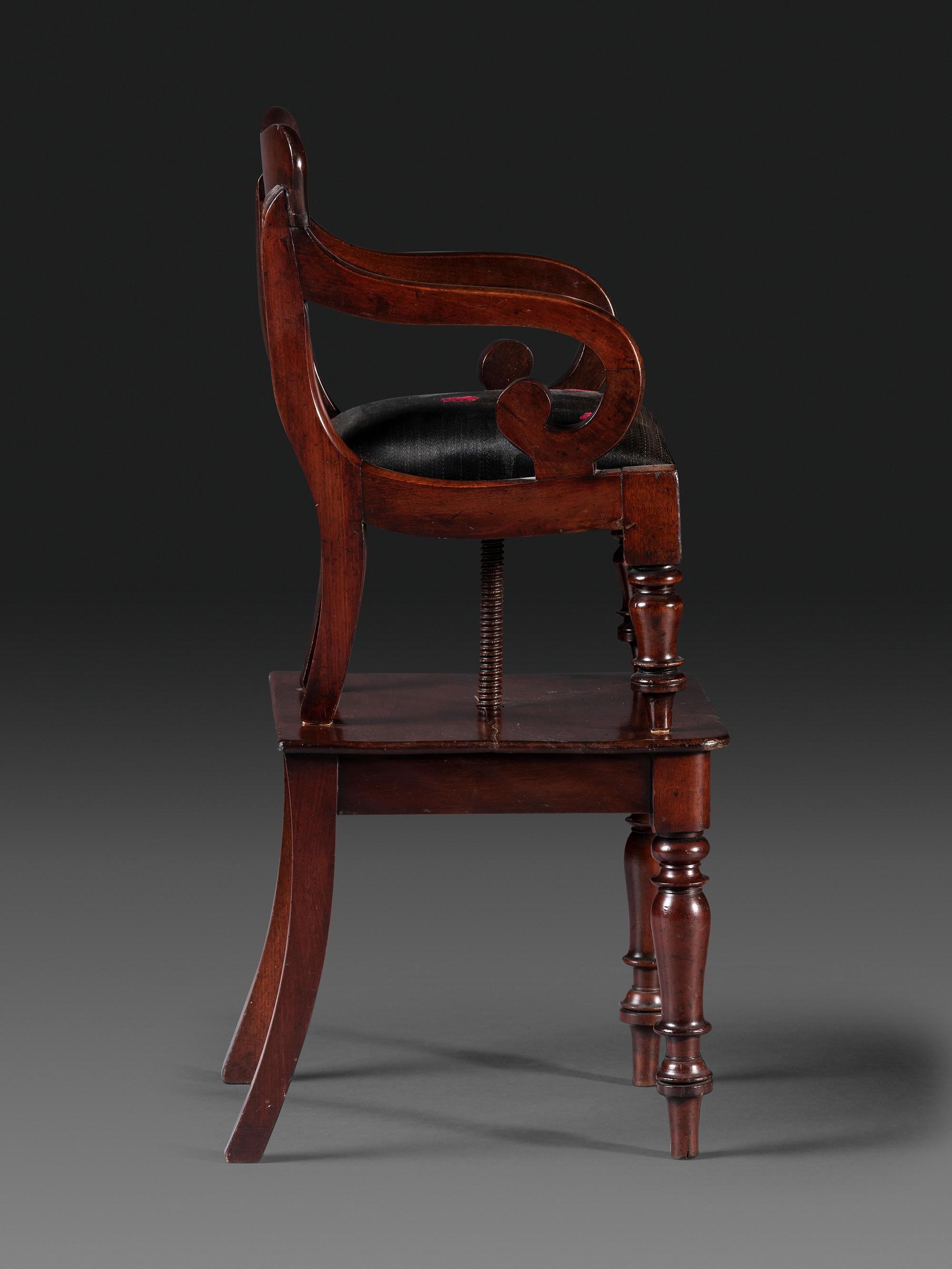 A Classical Carved Mahogany Child's Chair on Stand