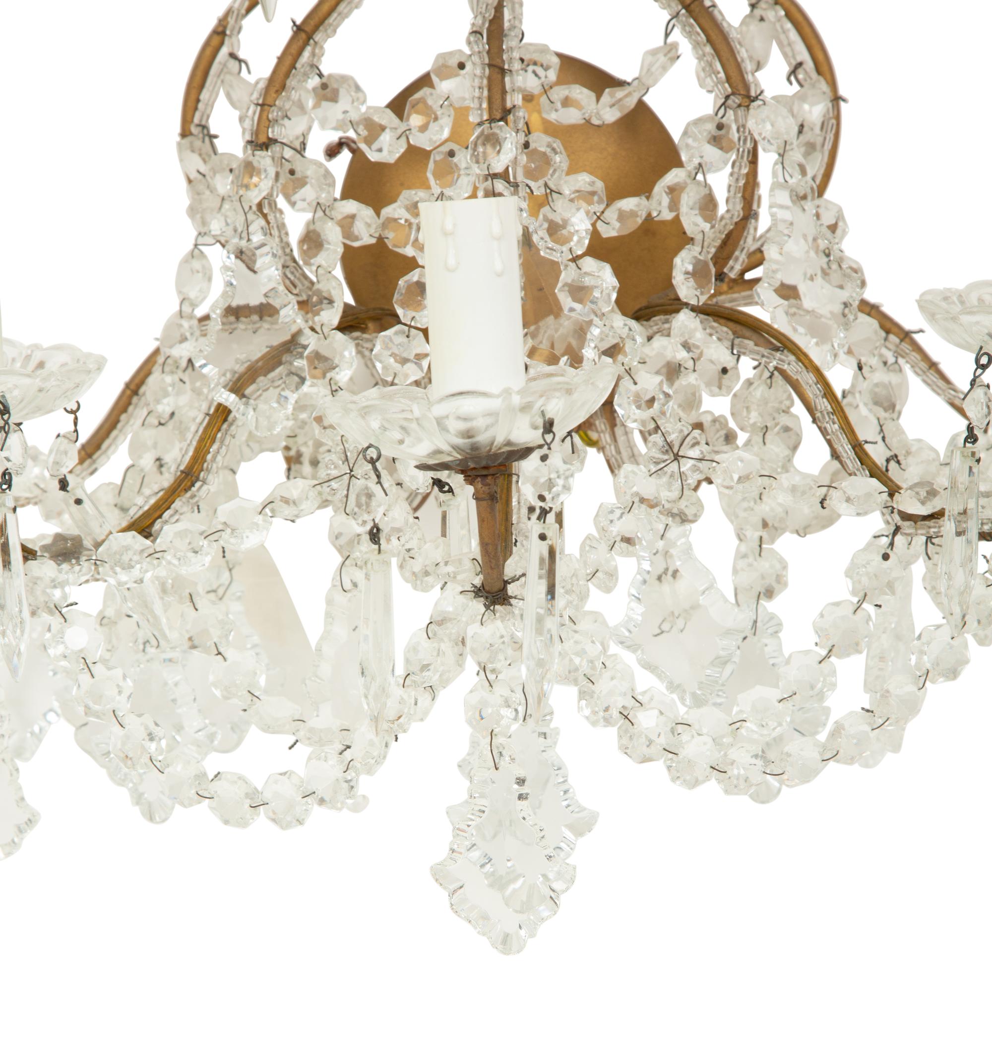 A Pair of French Gilt Metal and Cut Beaded Glass Three-Branch Wall Lights