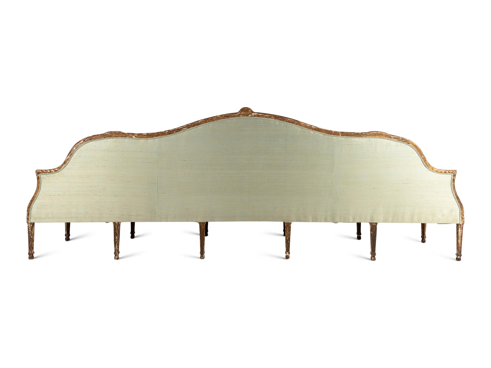 A George III Giltwood Confidante Sofa