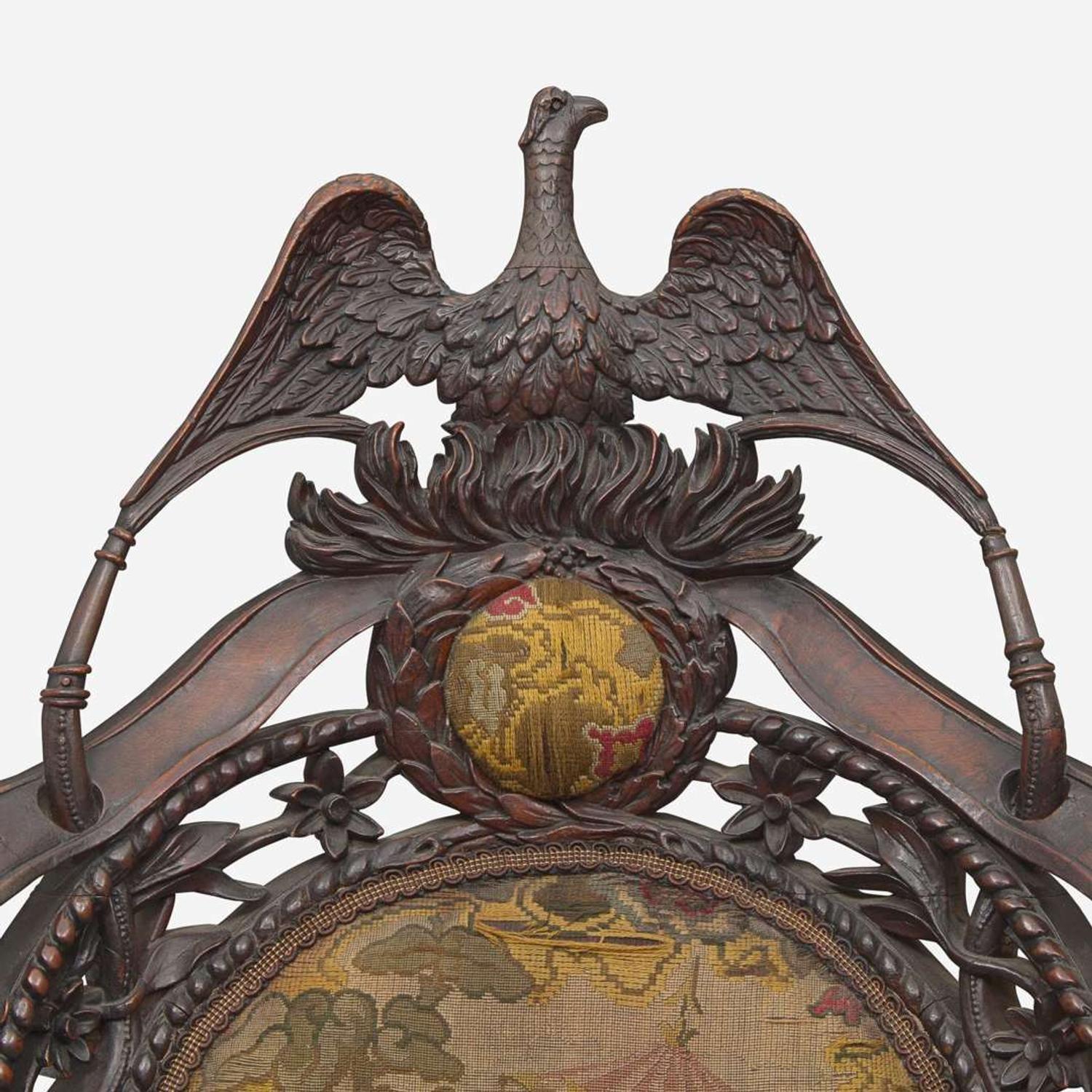 A Rococo revival carved oak fire company armchair circa 1860