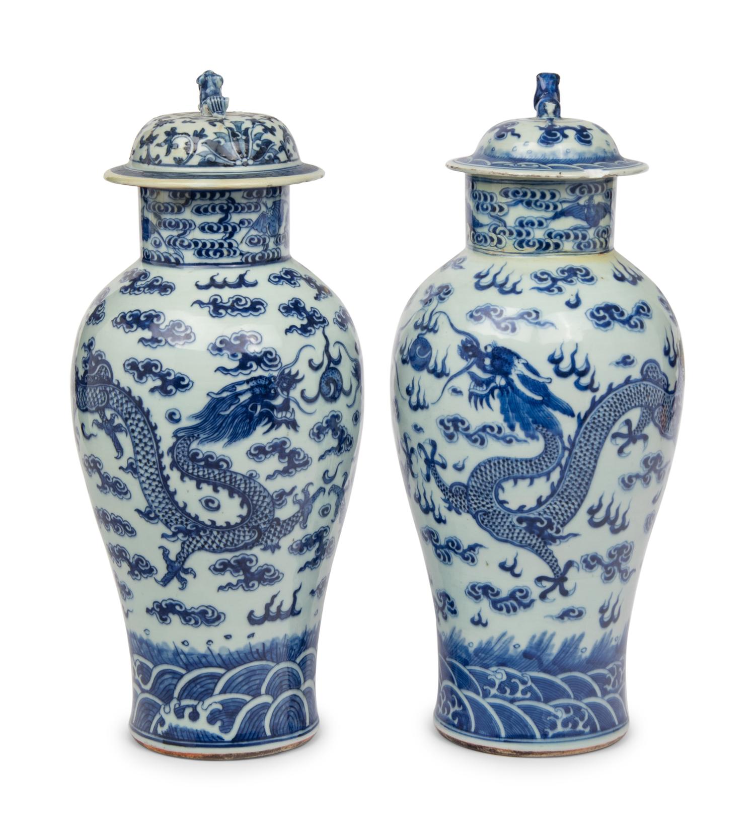 A Near Pair of Chinese Porcelain Covered Vases