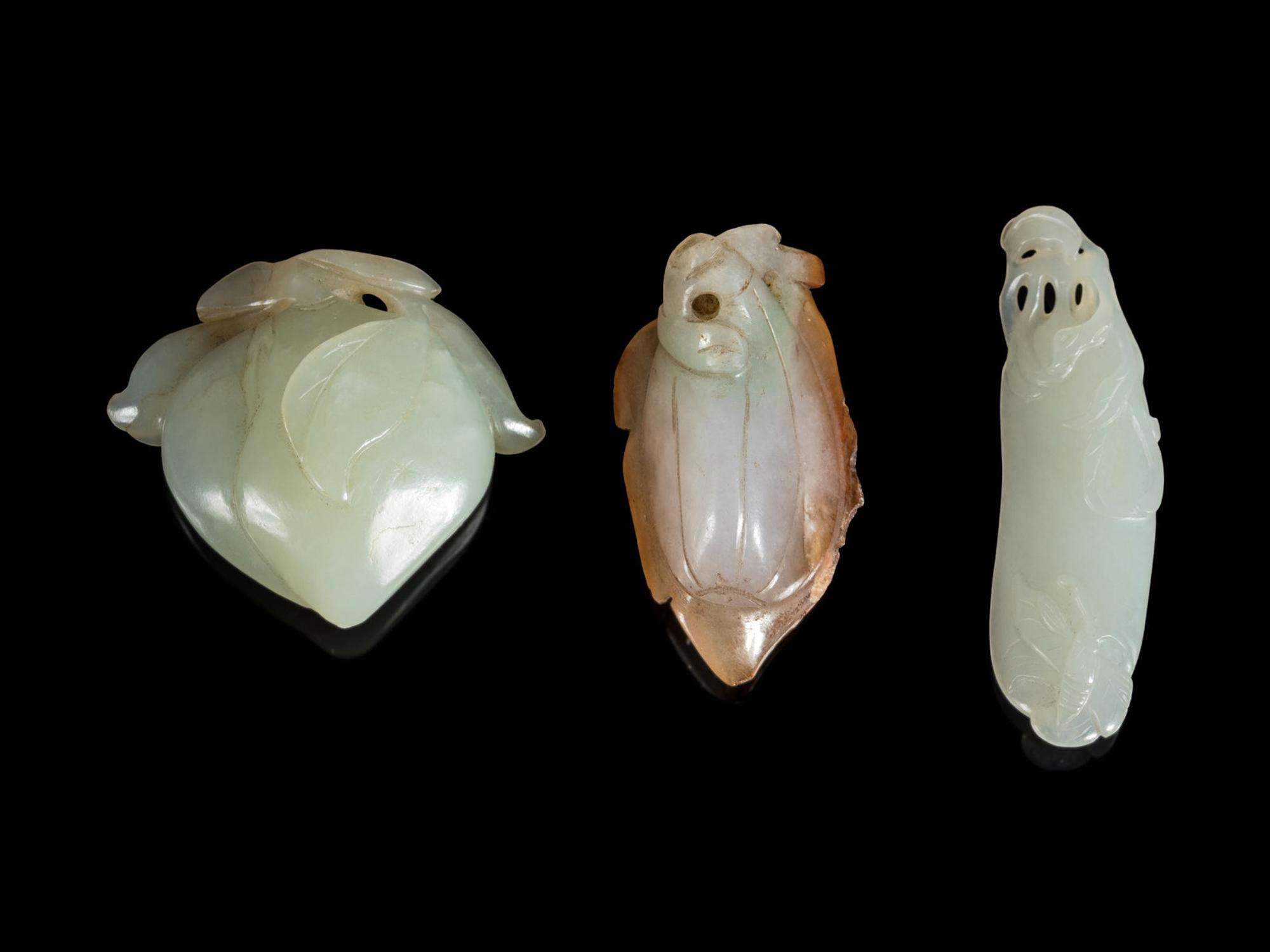Three Carved Jade and Jadeite Fruit and Melon-Form Pendants