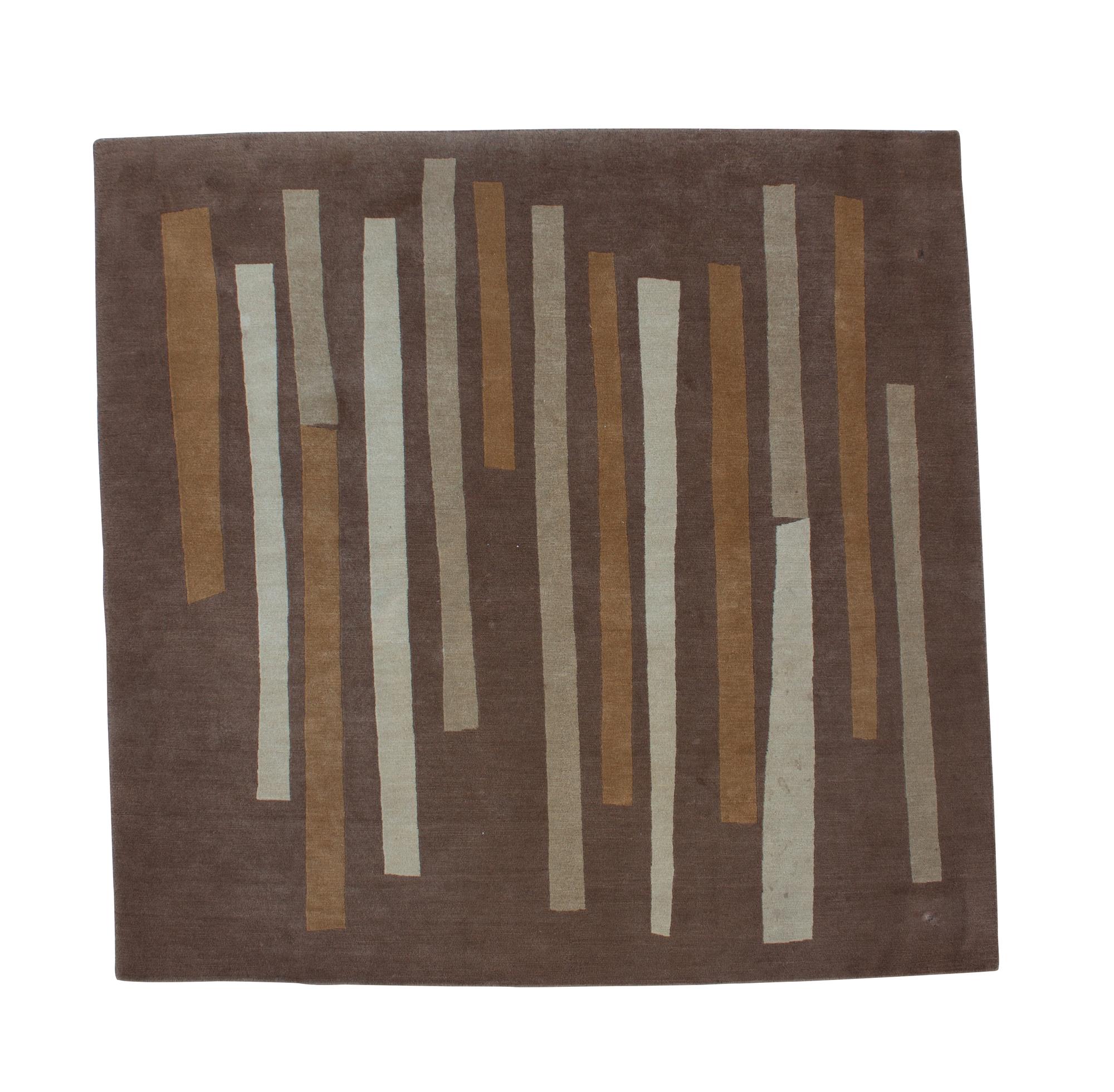 A Contemporary Wool Rug 6 feet 5 1/2 inches x 6 feet 7 1/4 inches. — JUDY ROSS