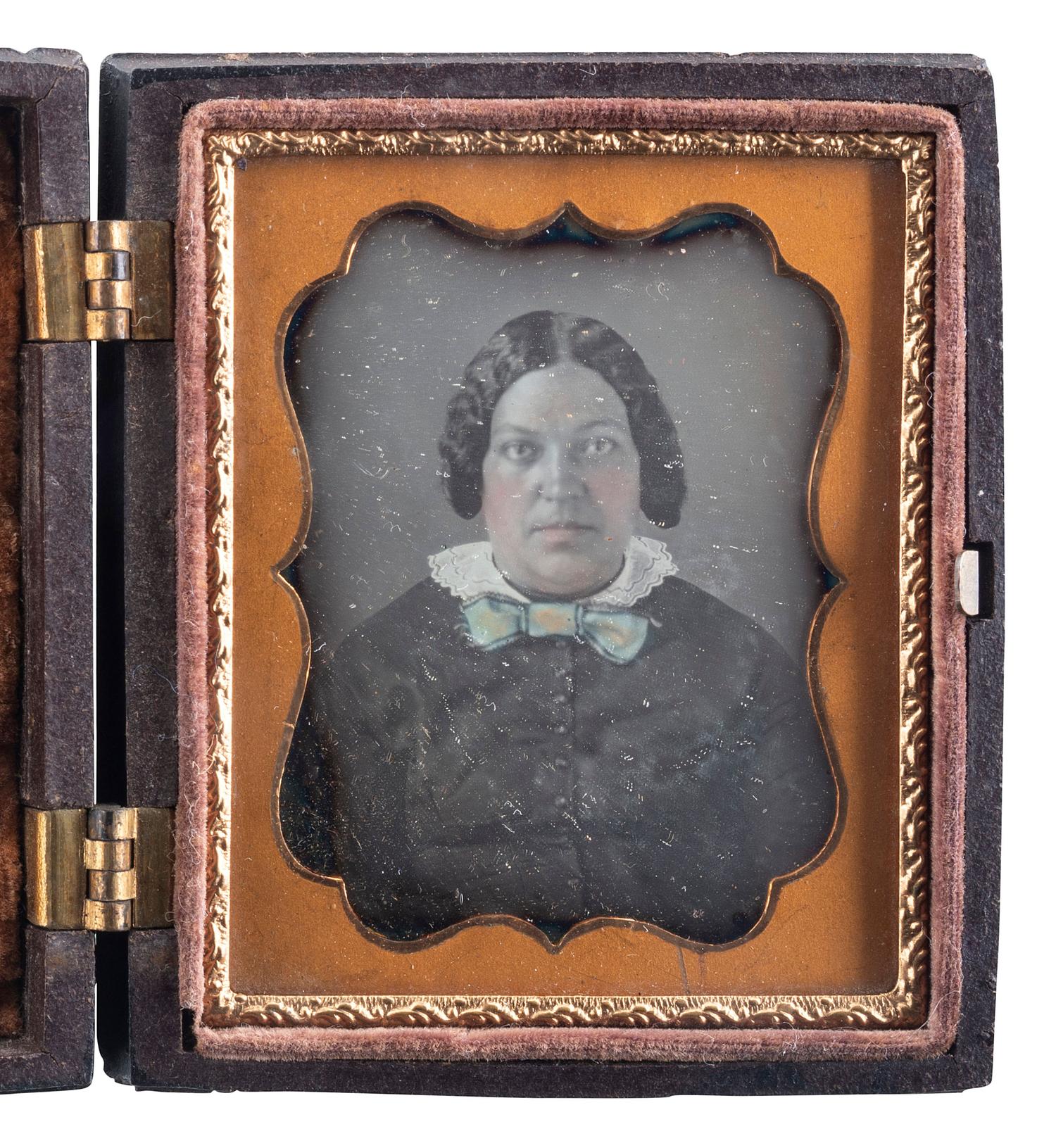 [EARLY PHOTOGRAPHY]. Ninth plate daguerreotype of African American woman.