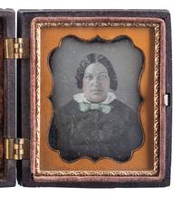[EARLY PHOTOGRAPHY]. Ninth plate daguerreotype of African American woman.
