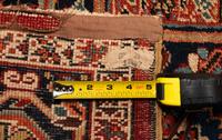 A Heriz Wool Rug