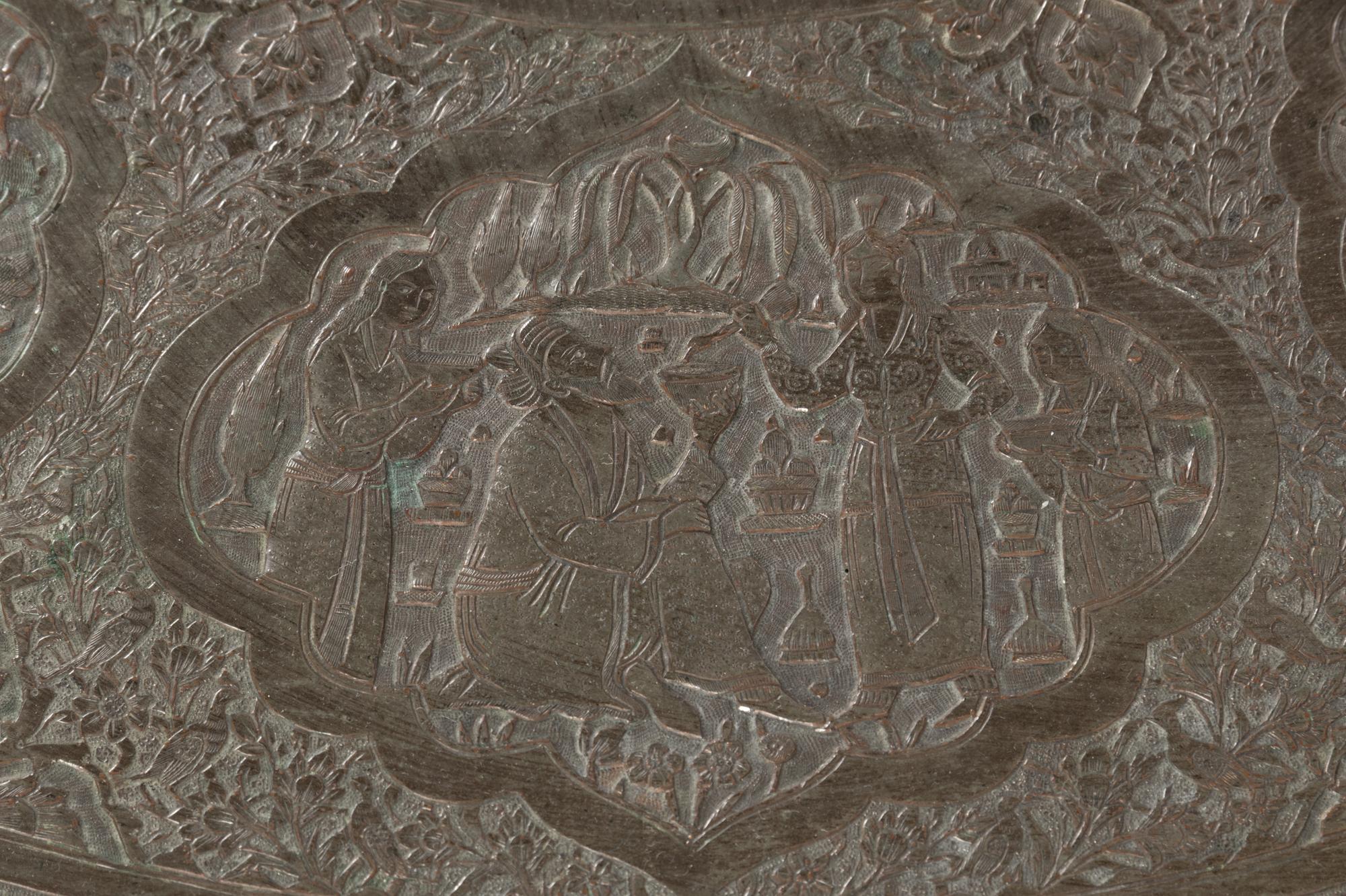 A Large Islamic Pressed Brass Tray on a Later Stand