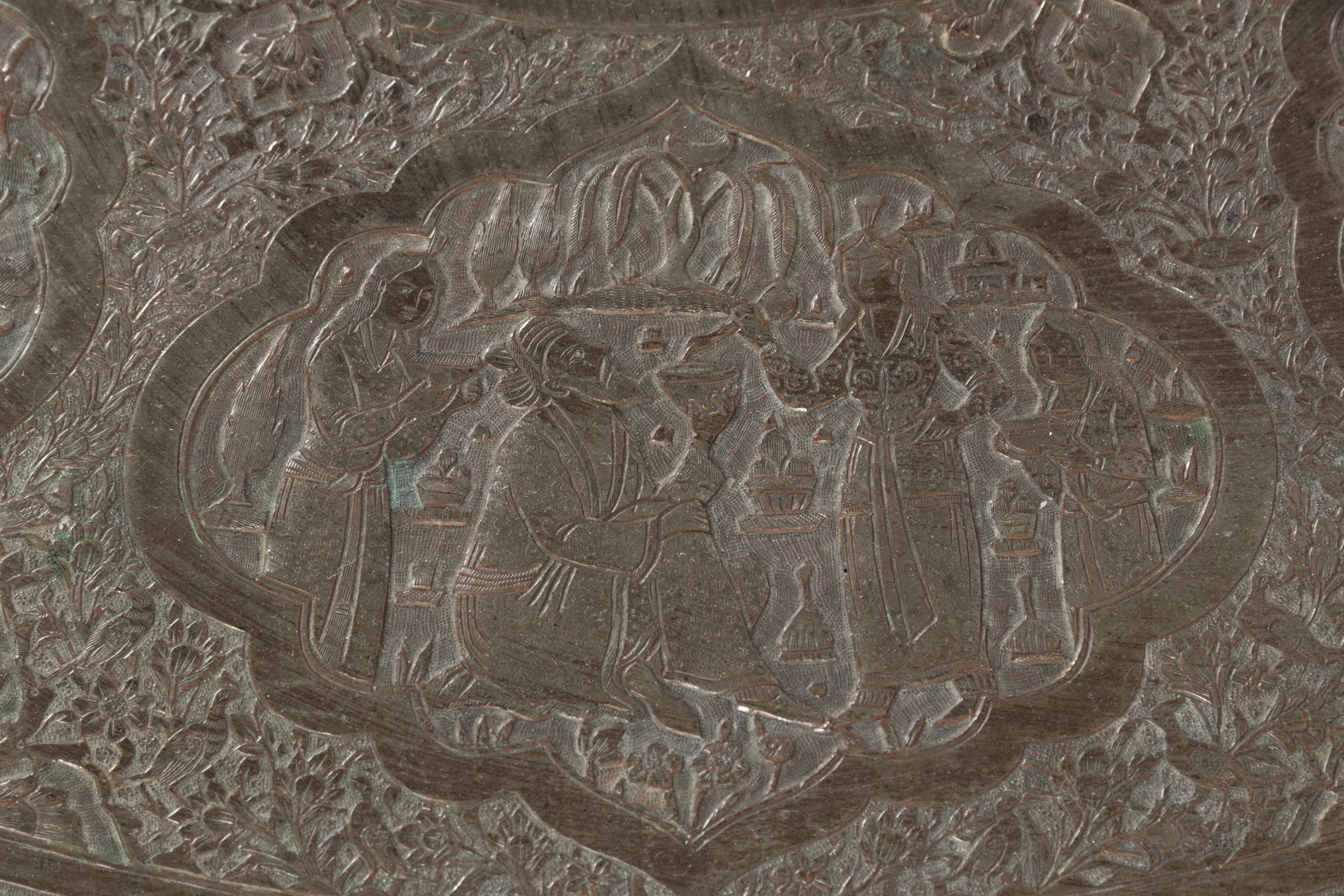 A Large Islamic Pressed Brass Tray on a Later Stand