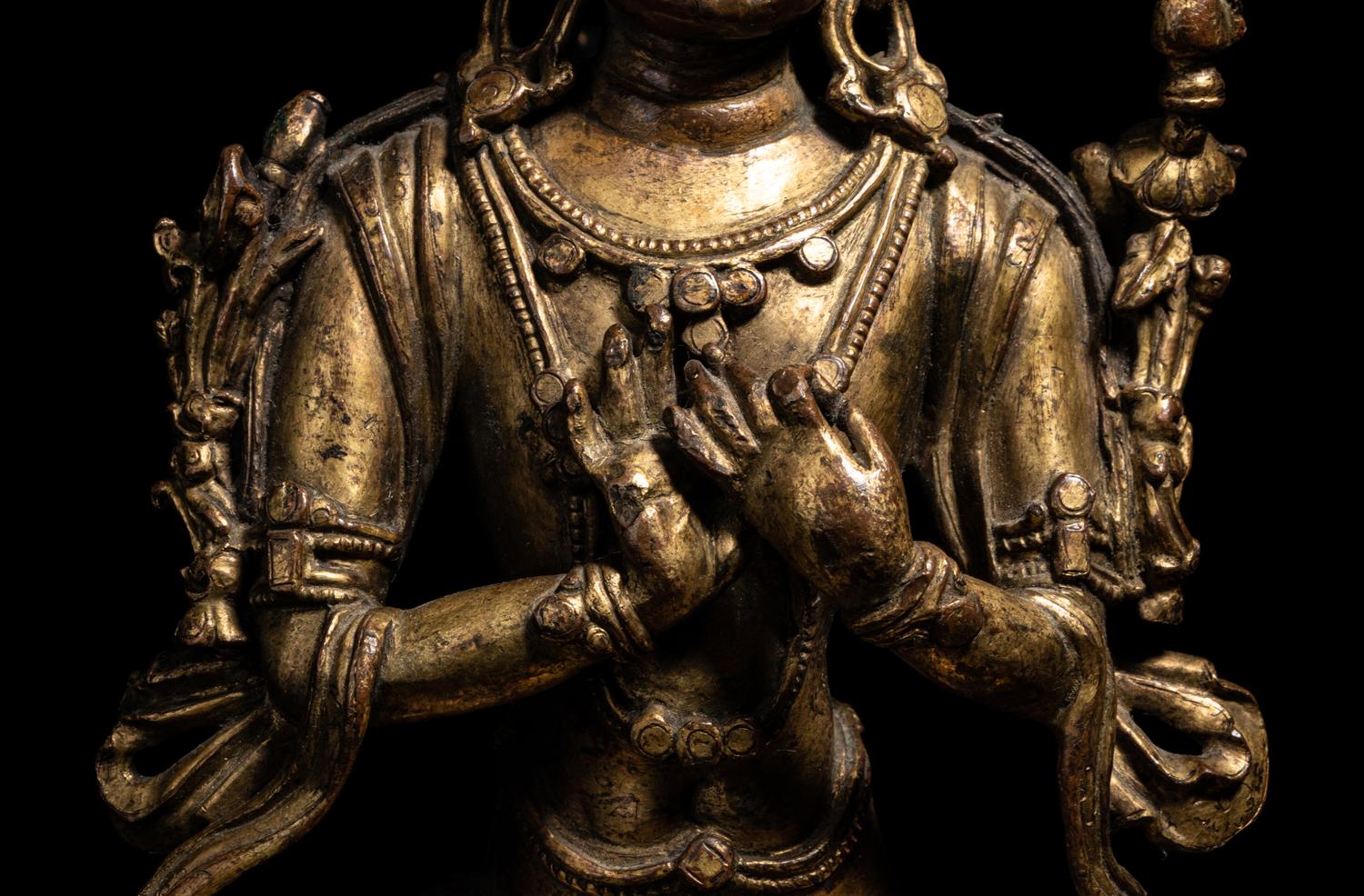 A Tibetan Gilt Bronze Seated Figure of Maitreya
