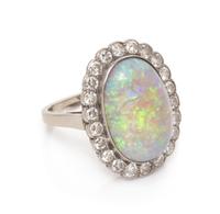 A Platinum, Opal and Diamond Ring, 3.85 dwts.