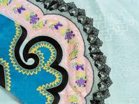 A Chinese Pale Blue Ground Gauze Embroidered Silk Lady's Robe