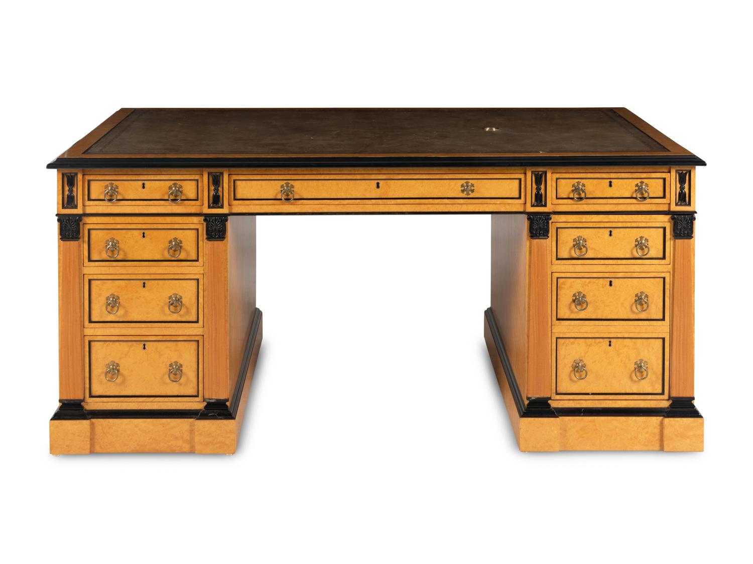 A Russian Neoclassical Style Birch and Parcel Ebonized Partner's Desk