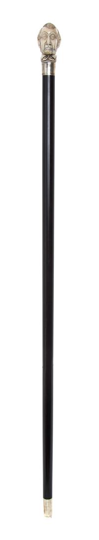 An American Ivory Automaton Handled Cane, Length of handle 2 5/8 x length overall 36 1/8 inches.