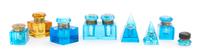 A Collection of Seven Blue Glass Inkwells, Width of widest 3 3/4 inches.
