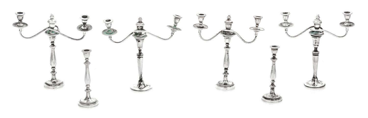 A Group of Six English Silver Candelabra, Stuart McCabe, London, each having a baluster form stem, comprising four three-light examples