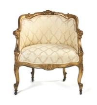 A Louis XV Style Giltwood Bergere, Height 32 inches.