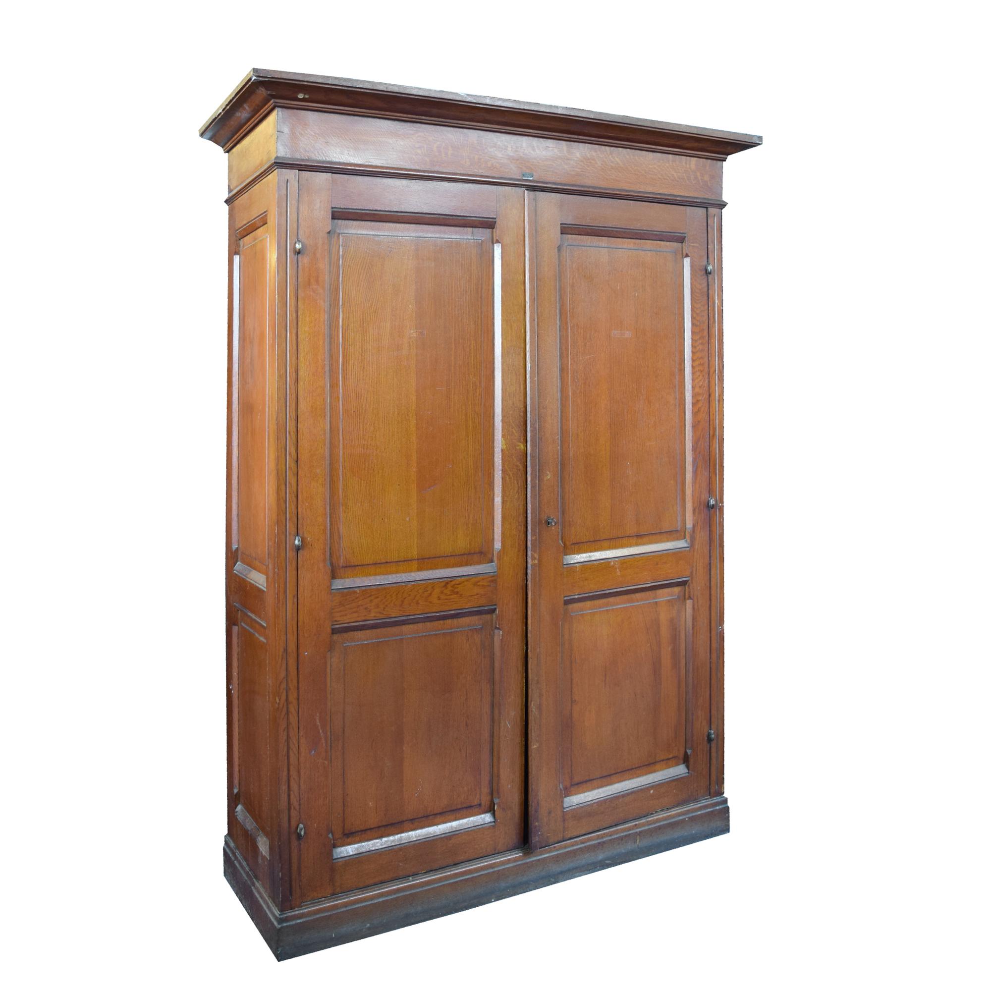 A Pine Two-Door Cabinet 57.5 "W x 21" D x 79" H — Italy, 19th Century