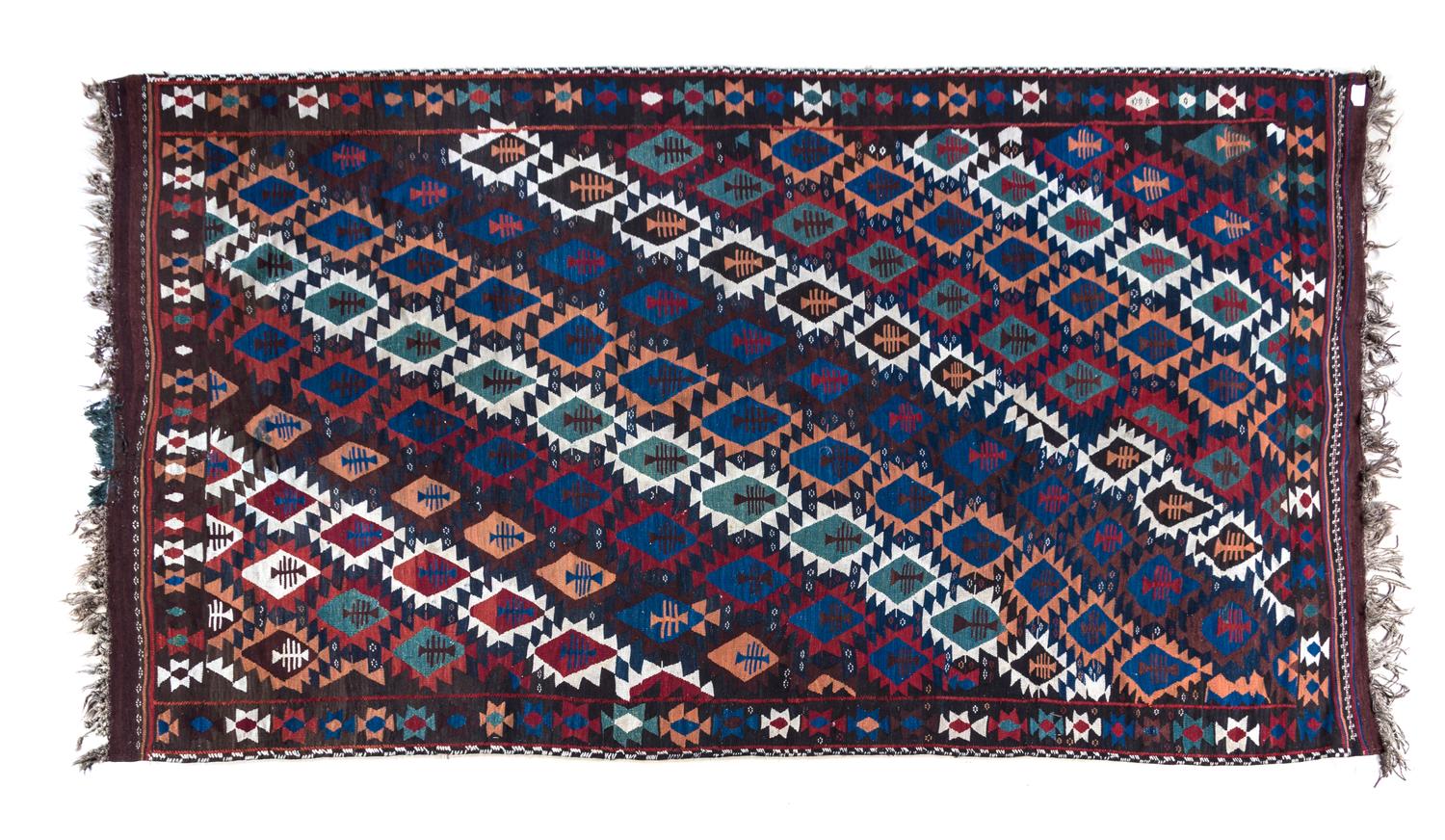 A Kilim Wool Rug 10 feet inches x 5 feet 11 inches.
