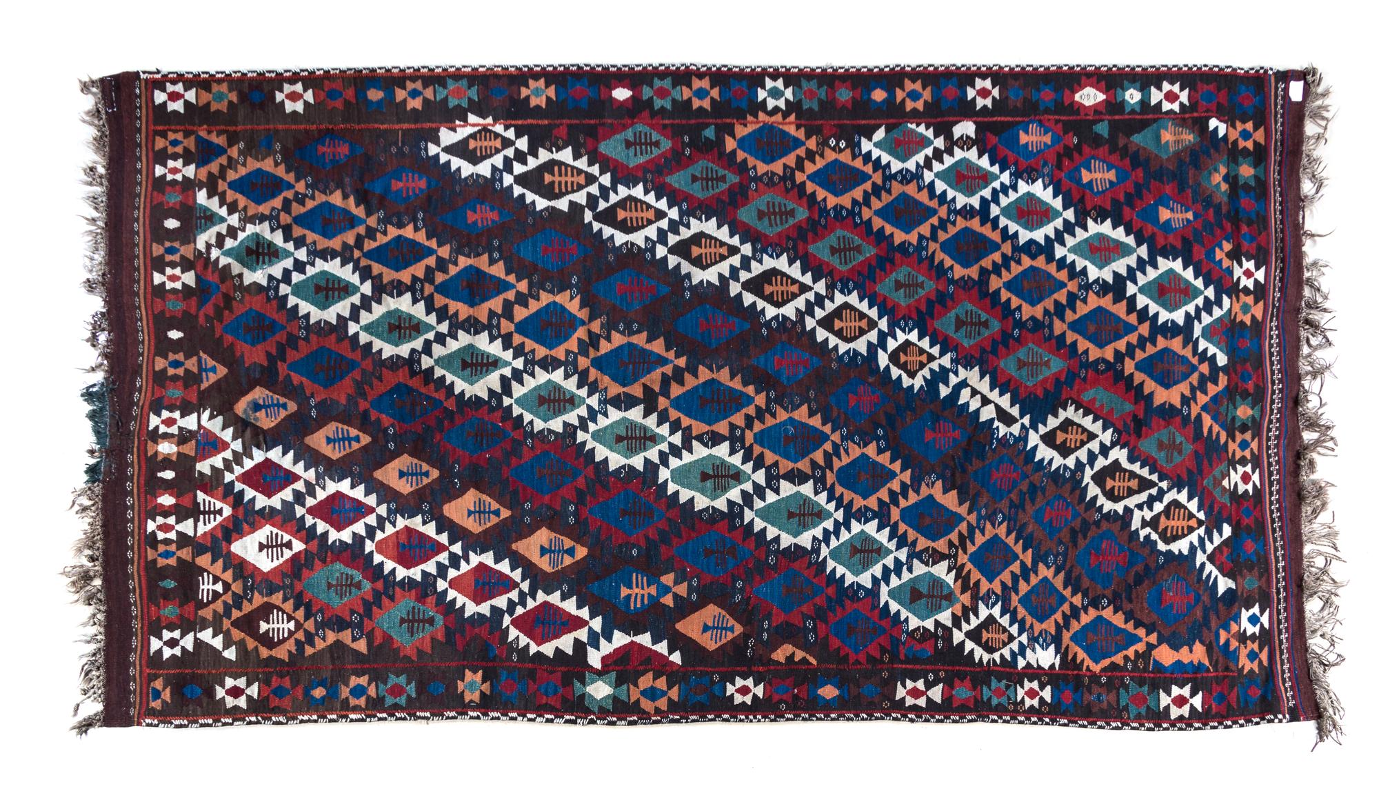 A Kilim Wool Rug 10 feet inches x 5 feet 11 inches.