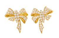 A Pair of Yellow Gold and Diamond Bow Motif Earclips, 11.00 dwts.