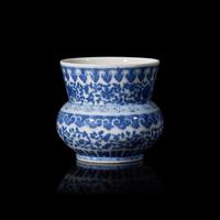 A Chinese Blue and White Porcelain Spitton, Zhadou 青花花卉紋渣斗