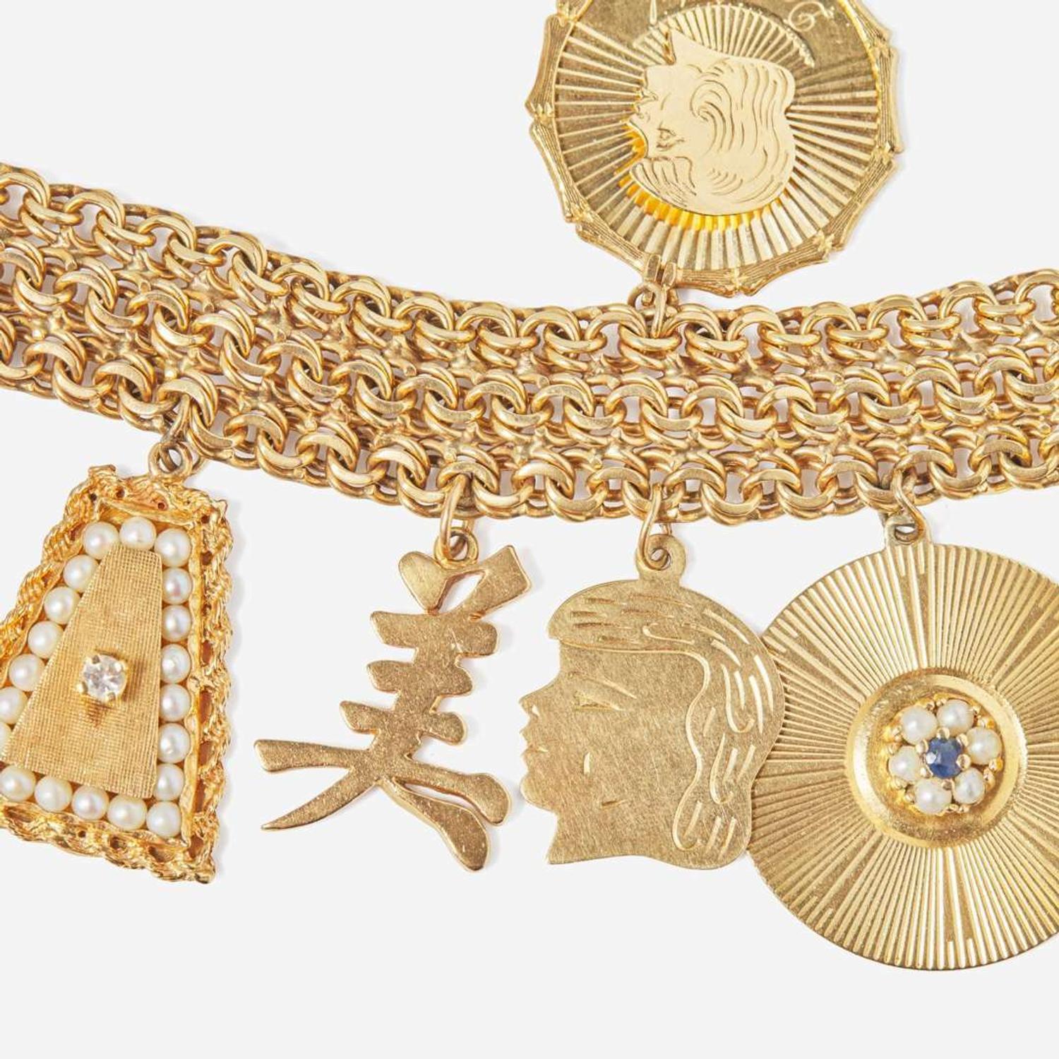 A 14K Yellow Gold Charm Bracelet