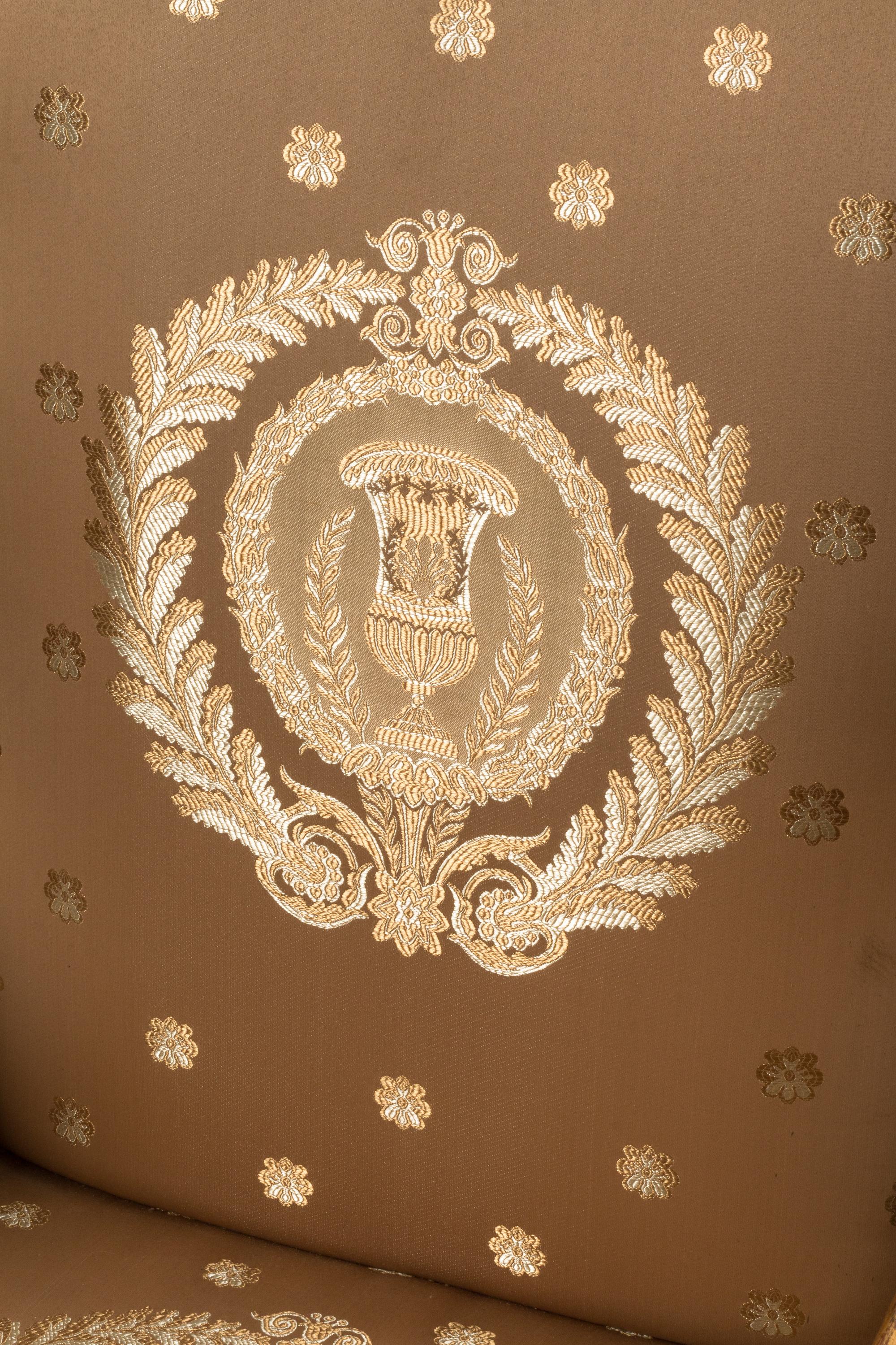 A Set of Four Italian Neoclassical Style Parcel Gilt Armchairs