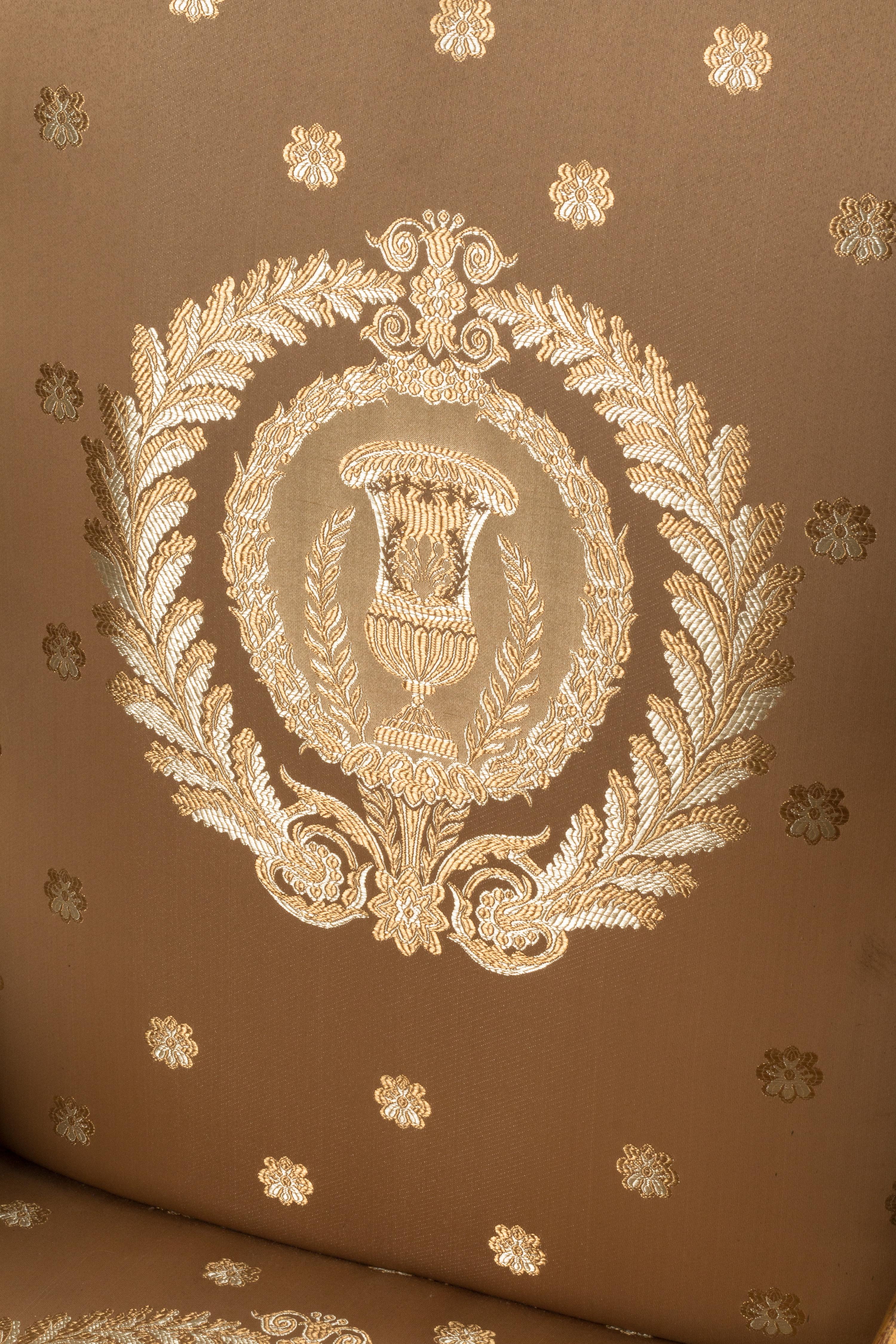 A Set of Four Italian Neoclassical Style Parcel Gilt Armchairs