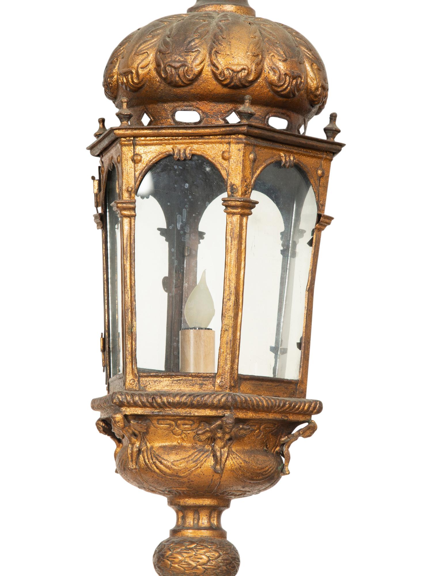 A Pair of Italian Painted and Parcel Gilt Tole Gondola Style Lanterns