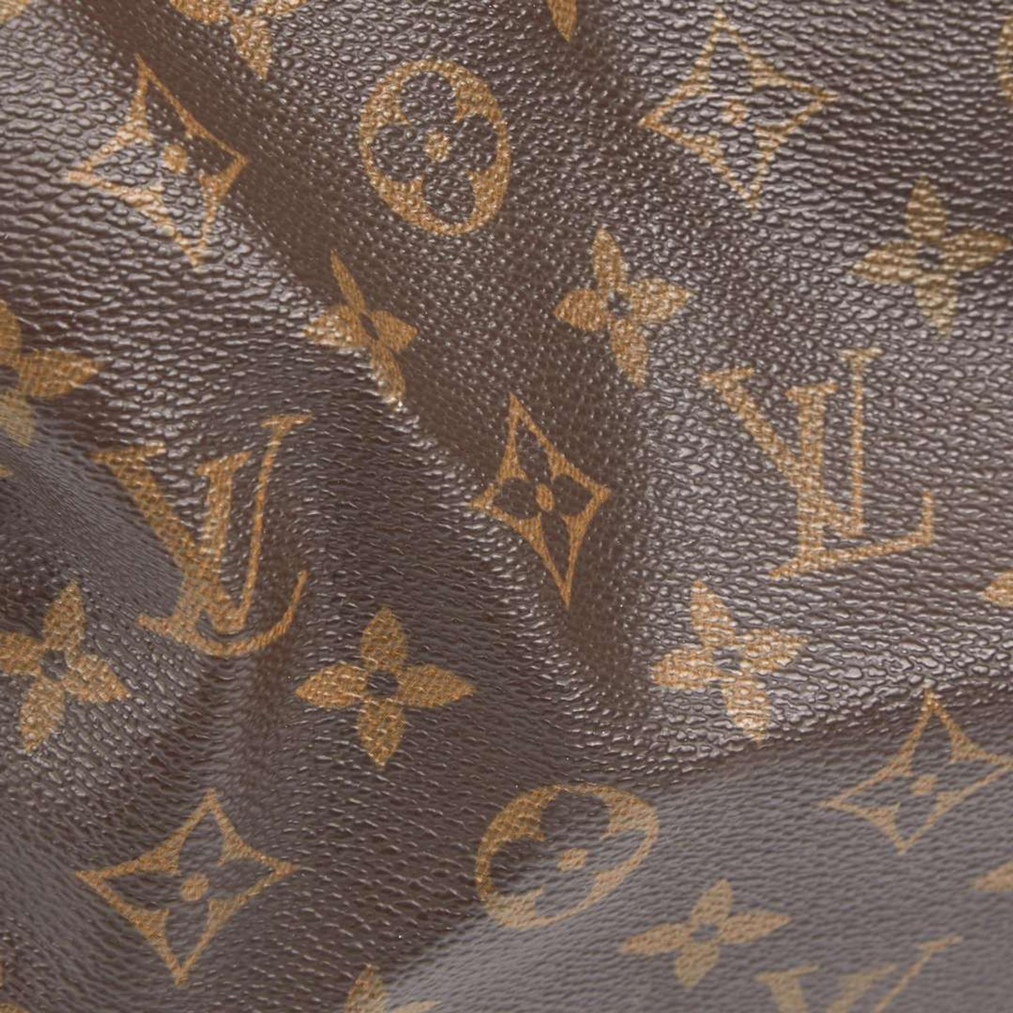 A Louis Vuitton Brown Monogram Speedy 30 Louis Vuitton