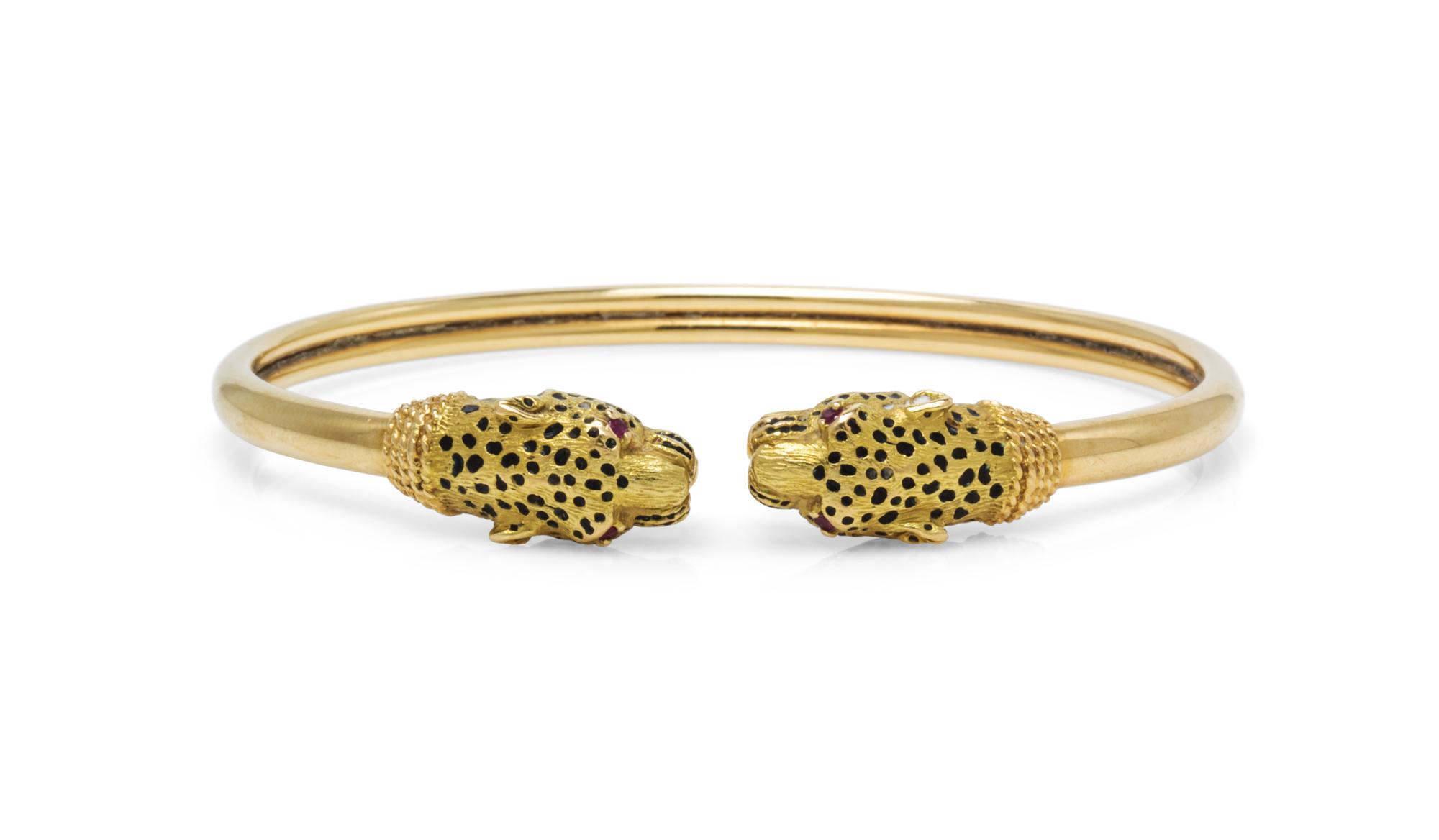 An 18 Karat Yellow Gold, Enamel and Ruby Panther Bracelet, French, 11.00 dwts.