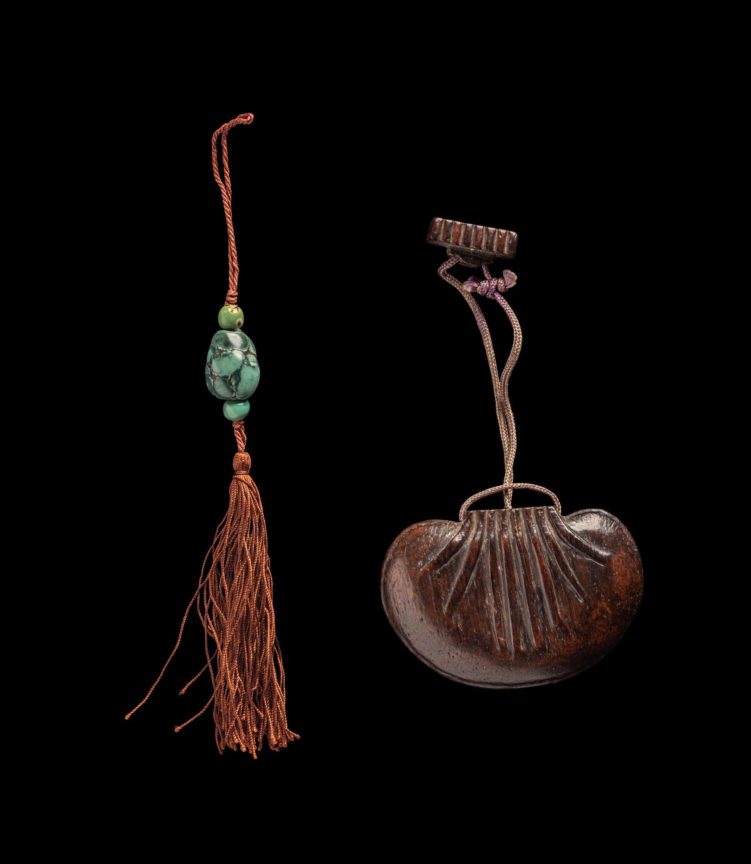 A Chinese Carved Hardwood Purse-Form Perfumier