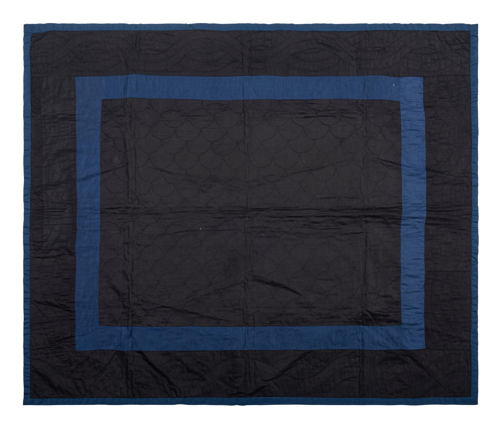 A Child's Black and Blue Satin and Cotton Quilt