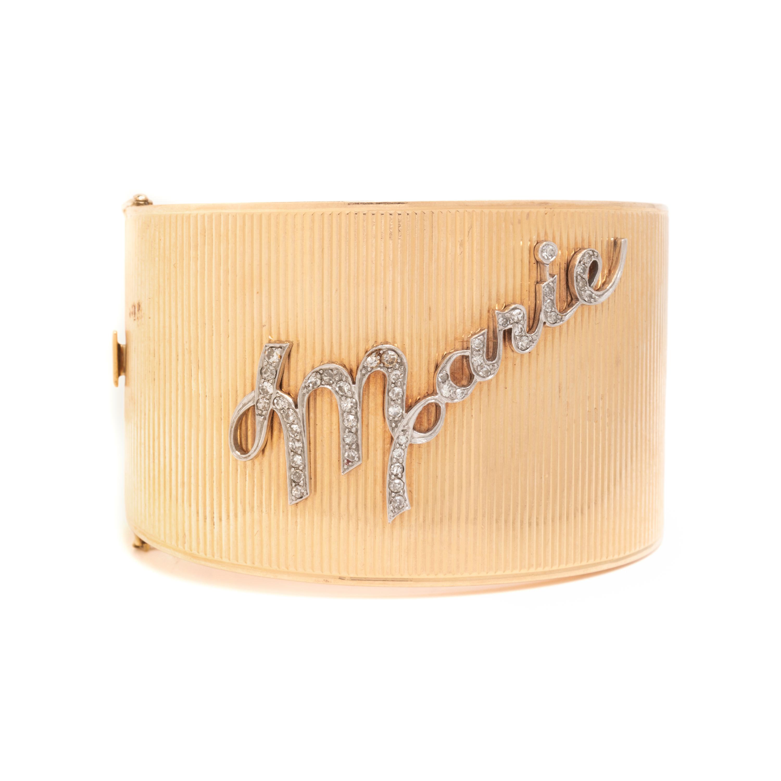 YELLOW GOLD AND DIAMOND ‘MARIE’ HINGED BANGLE BRACELET