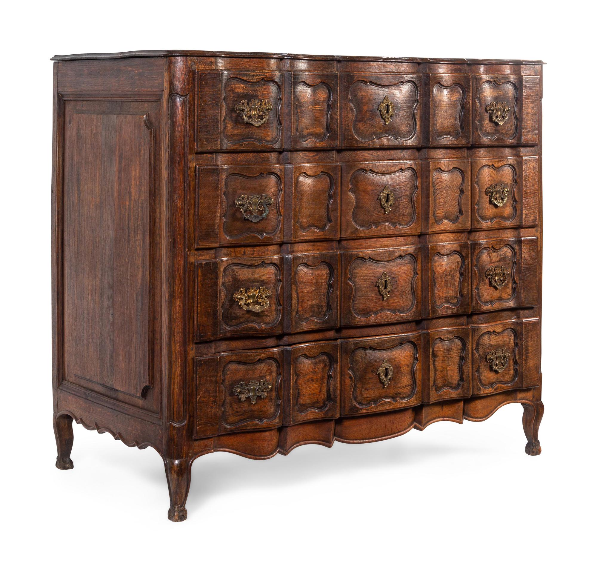 A Louis XV Provincial Style Oak Commode