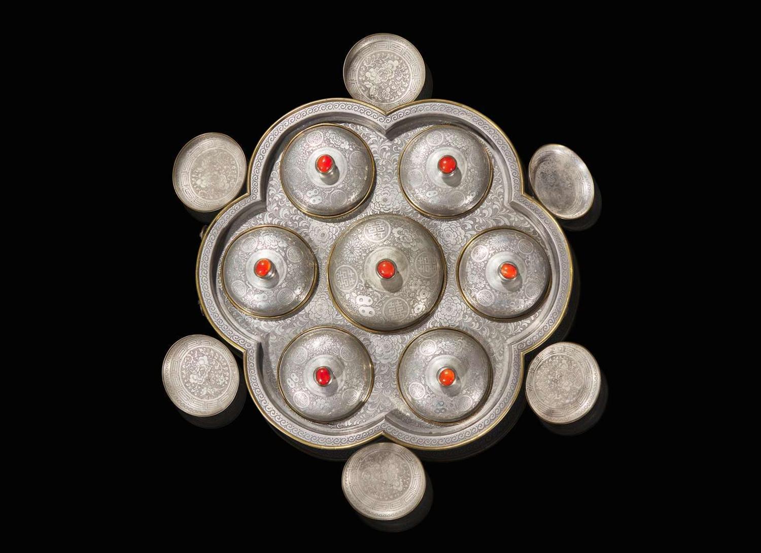 A large Chinese Cantonese embellished pewter sweetmeat set 廣作錫器一套