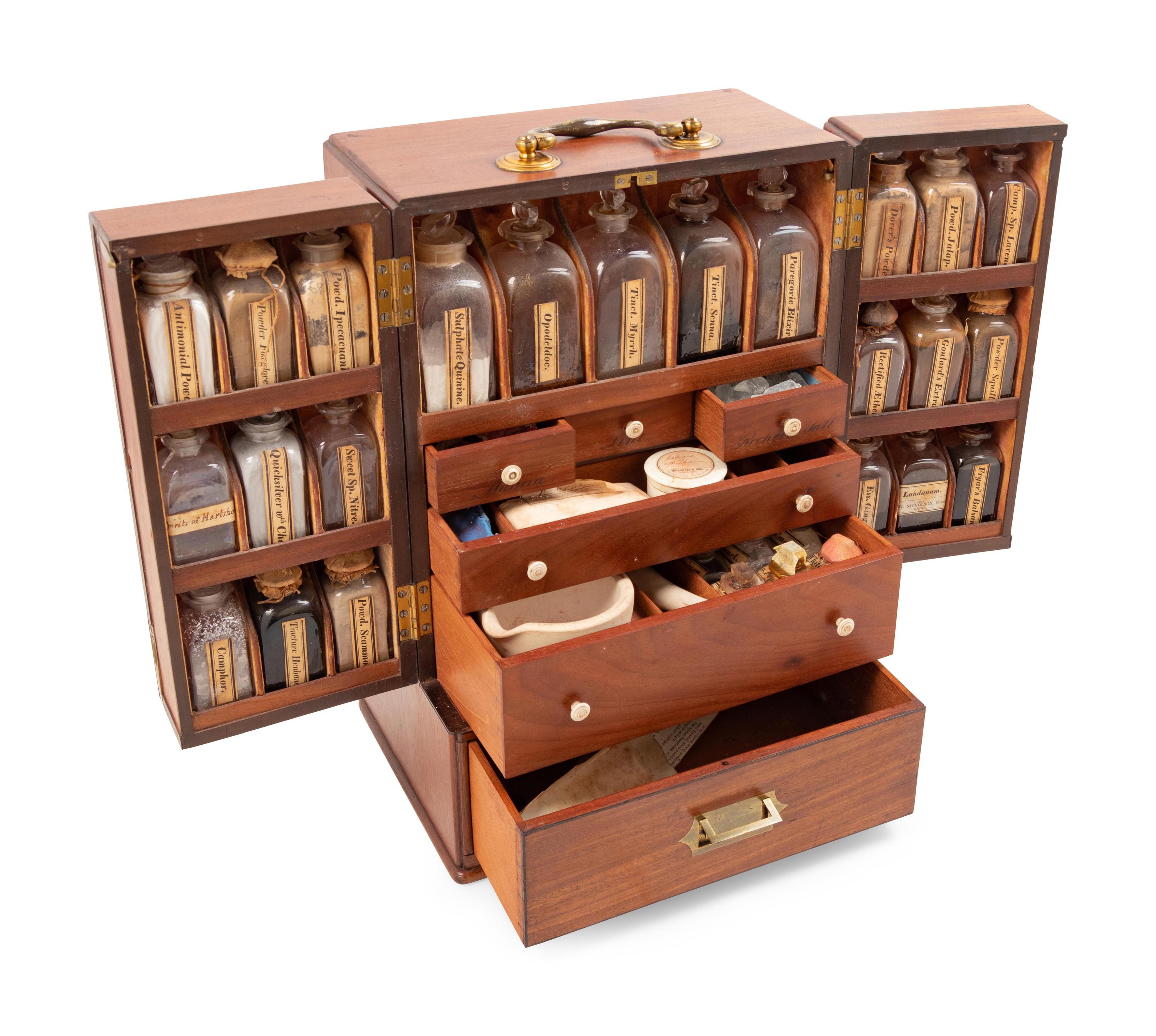A Regency Figured Mahogany Travelling Apothecary Chest