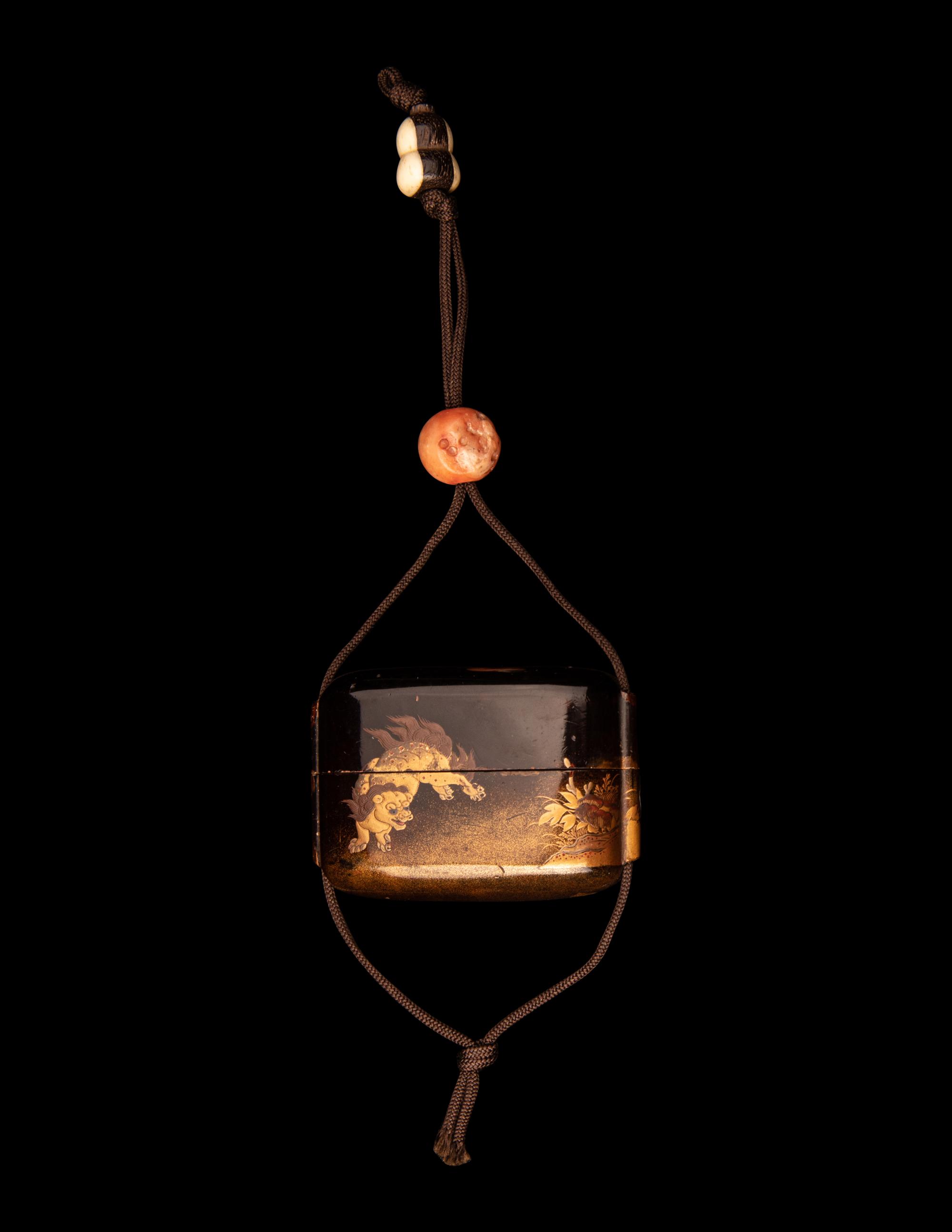 A Japanese Gold and Dark Brown Lacquer Single-Case Inro