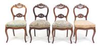 A Set of Four Victorian Walnut Chairs Height 33 1/2 inches. — 19TH/20TH CENTURY