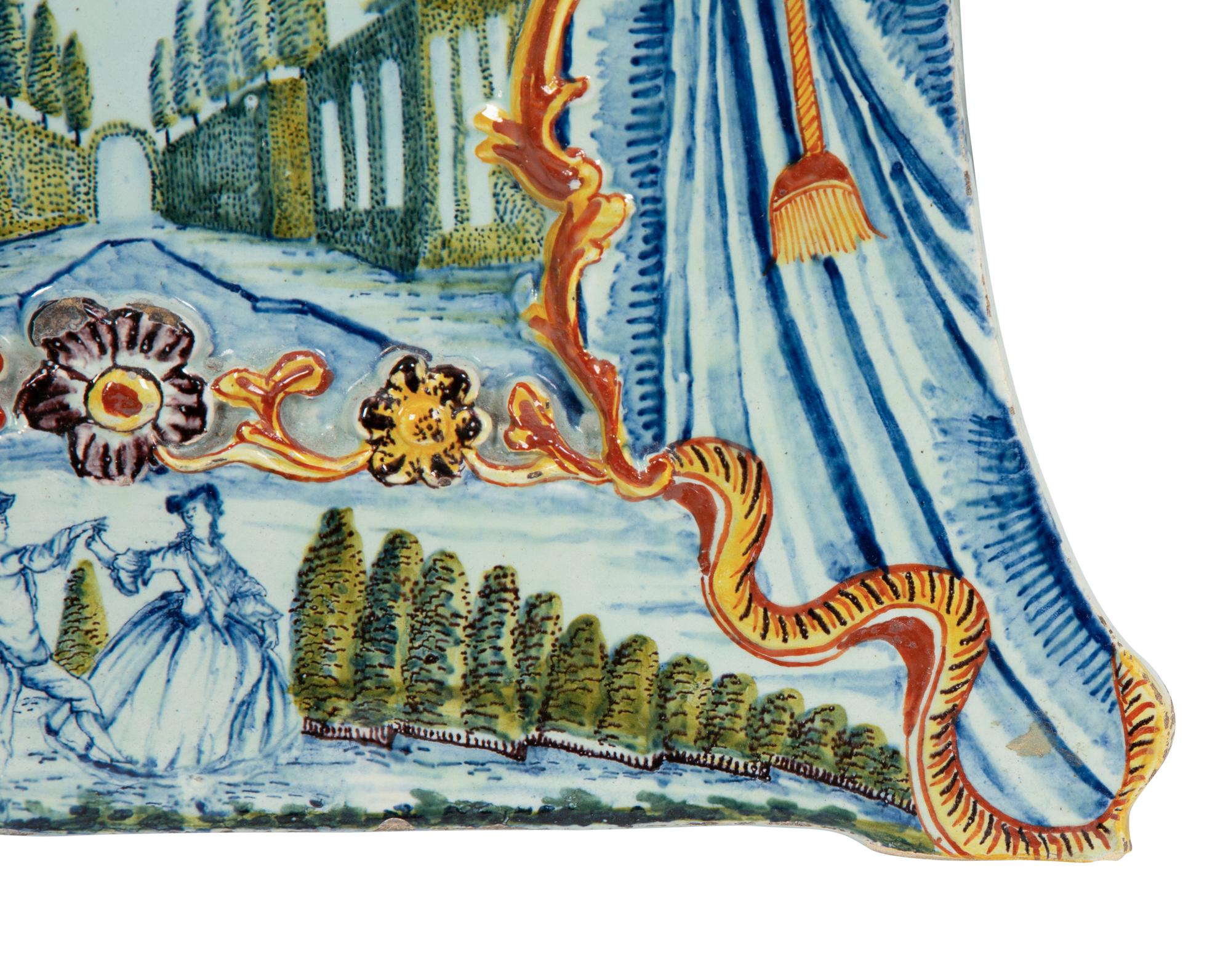 A Pair of Continental Polychrome Faience Wall Plaques