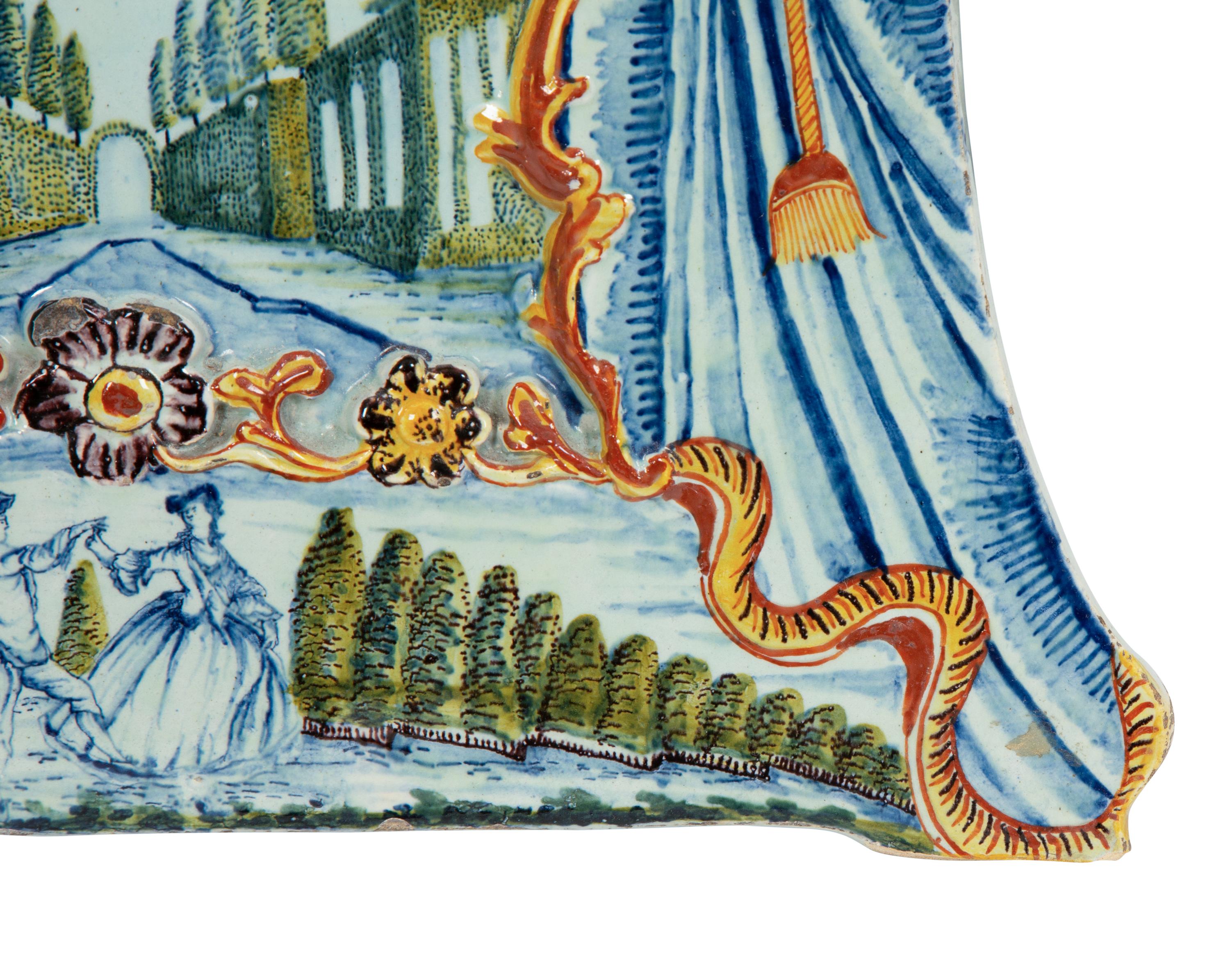 A Pair of Continental Polychrome Faience Wall Plaques