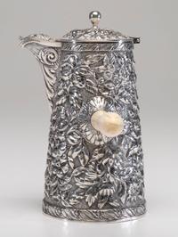 An American Silver Repoussé Chocolate Pot