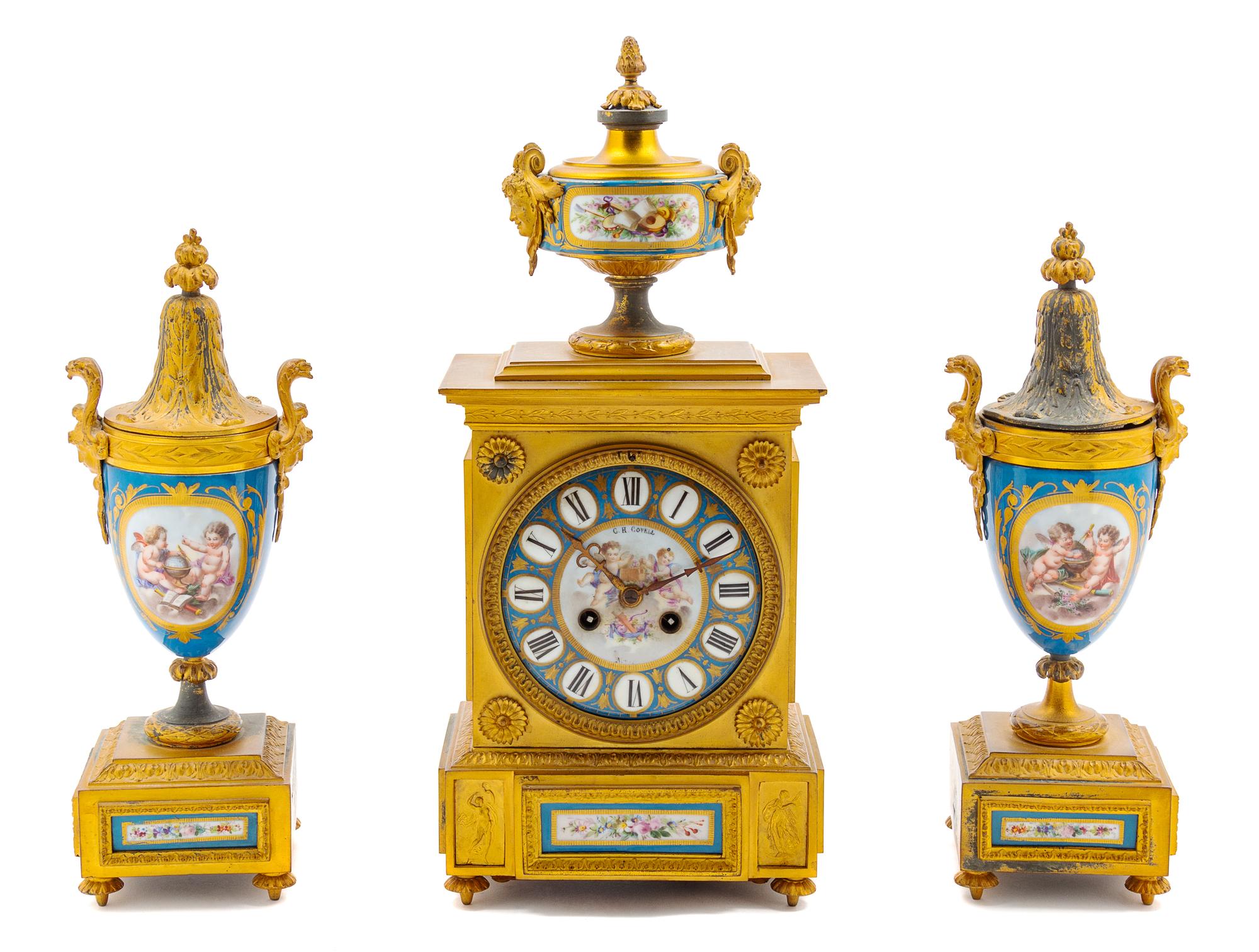 A Sevres Style Porcelain and Gilt Bronze Clock Garniture Height of mantel clock 18 inches. — 19TH CENTURY