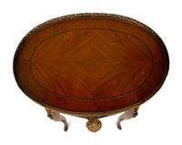 A Louis XV/XVI Transitional Style Gilt Metal Mounted Fruitwood Side Table