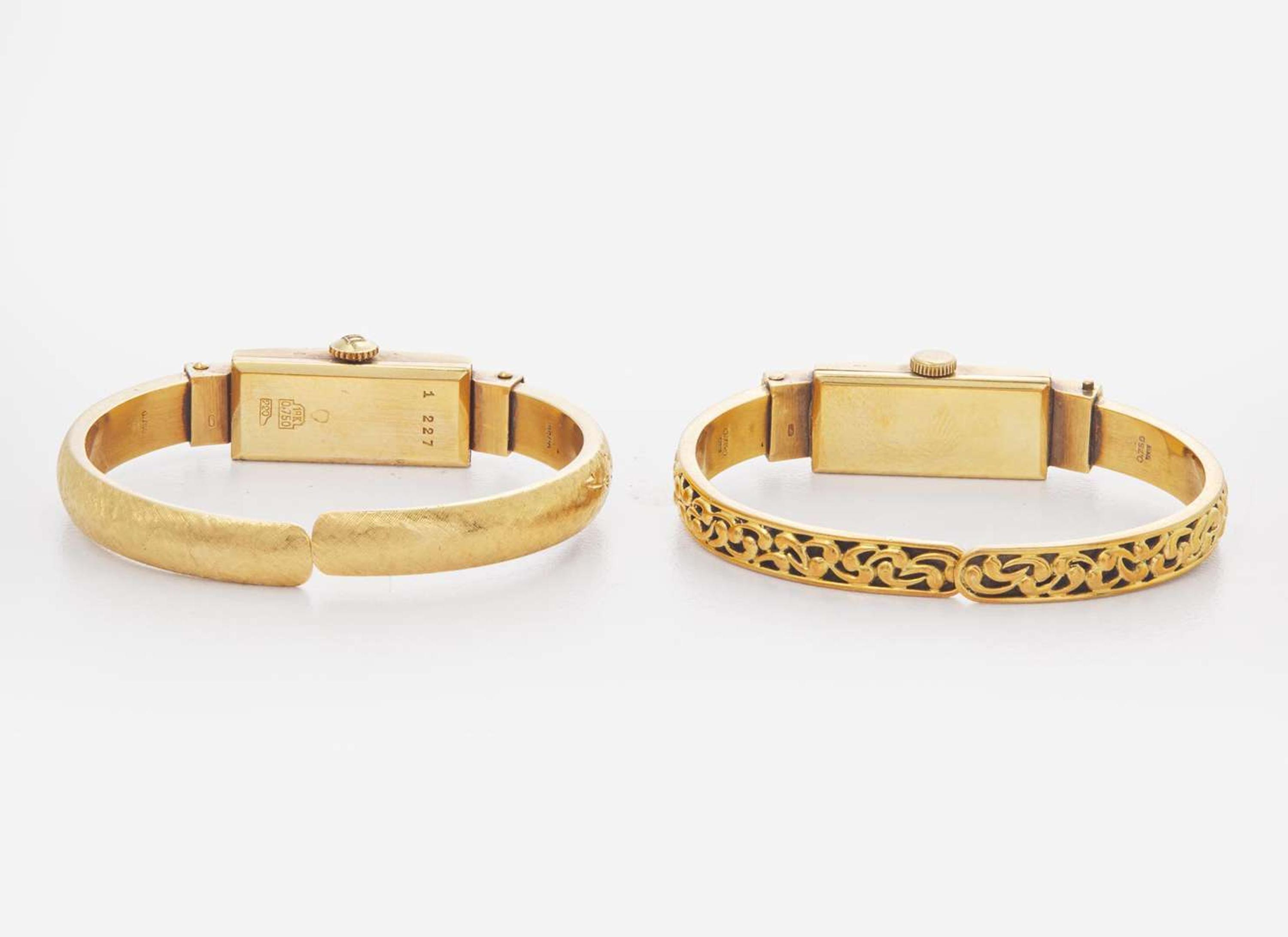 A Set of Two Vintage 18K Yellow Gold Bangle Watches