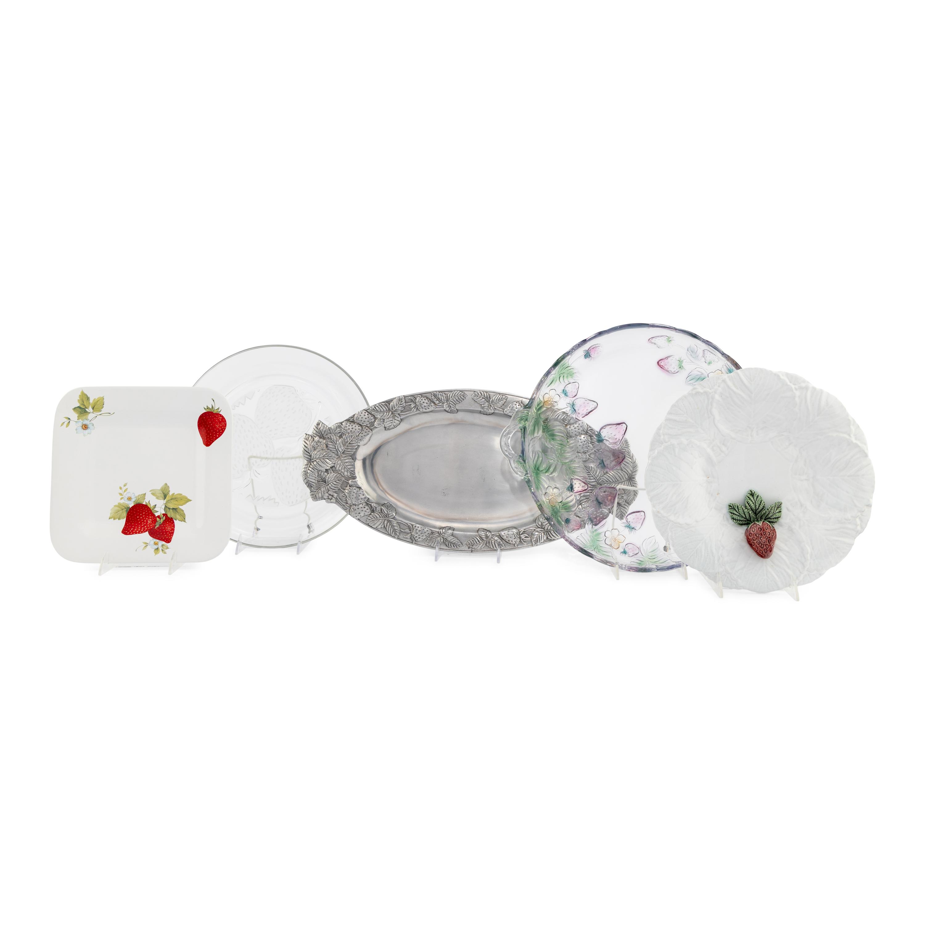 A Group of Strawberry Themed Serving Platters